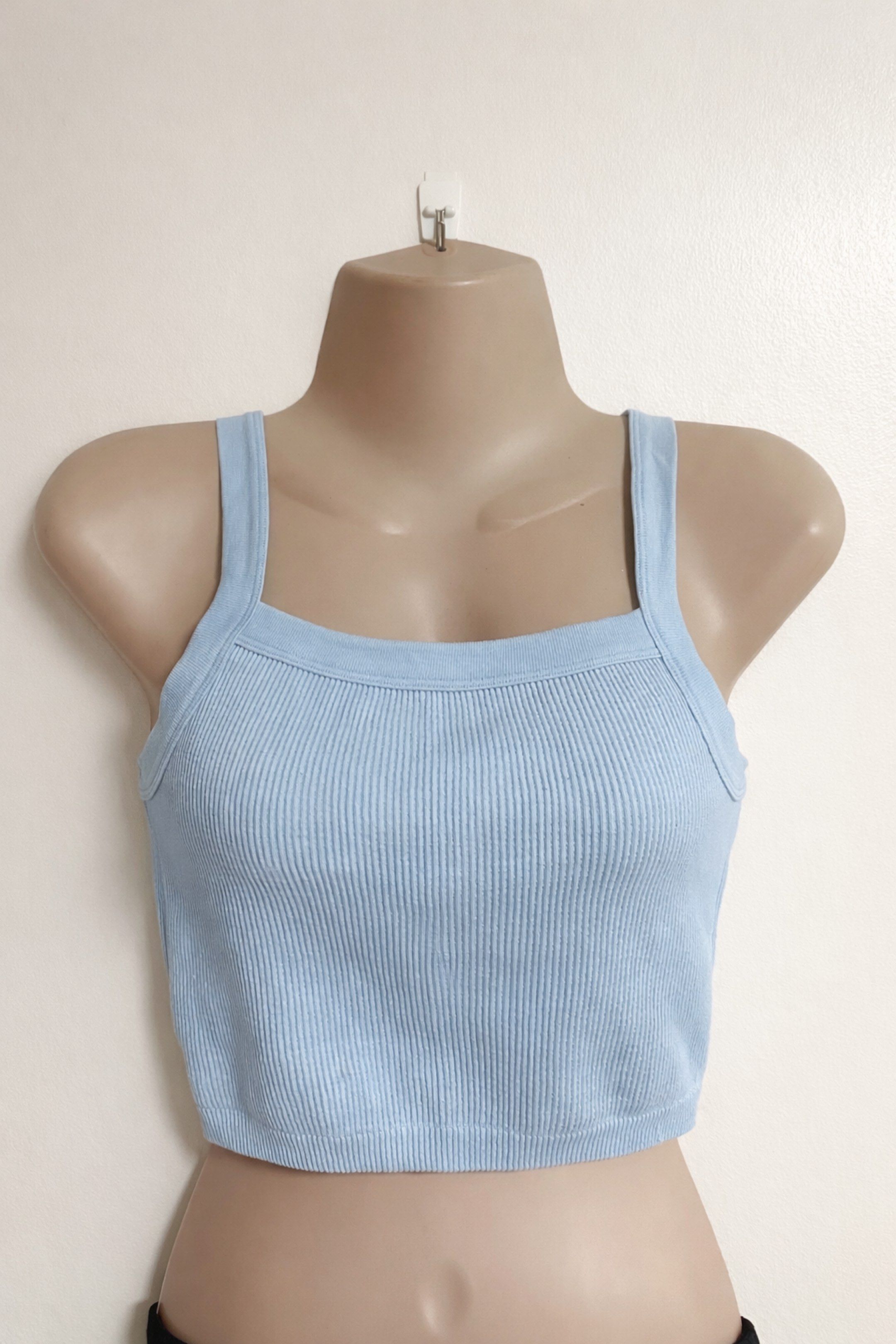 Cotton On Ribbed Crop Top (XS-M) (Category: Shirts) located in Manila. Submitted by chaneli2629 (Listing ID 1421220113, Image 1). Description: - Light blue ribbed crop top - Size: M on tag|-Fits XS-M - Features a square neckline.