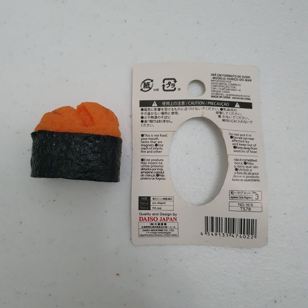 Daiso Sushi Magnet sea urchin (Category: Designer & Blind Box Toys) located in Paranaque City. Submitted by cobien (Listing ID 1421225432, Image 3). Description: - Daiso Japan sushi-shaped magnet - Features sushi with orange topping and black seaweed - White magnet back - Includes original packaging - Packaging has Japanese text and barcode.