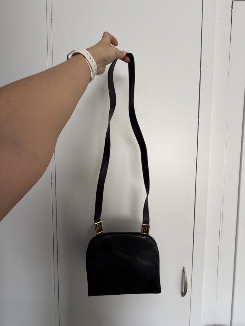 Di Sandro Black Leather Shoulder Bag (Category: Luxury Bags & Wallets) located in Makati City. Submitted by lenyfelix (Listing ID 1421194195, Image 1). Description: - Di Sandro black leather shoulder bag - Genuine leather - Rectangular shape - Long strap - Gold-toned hardware - Interior pocket - Made in Italy.