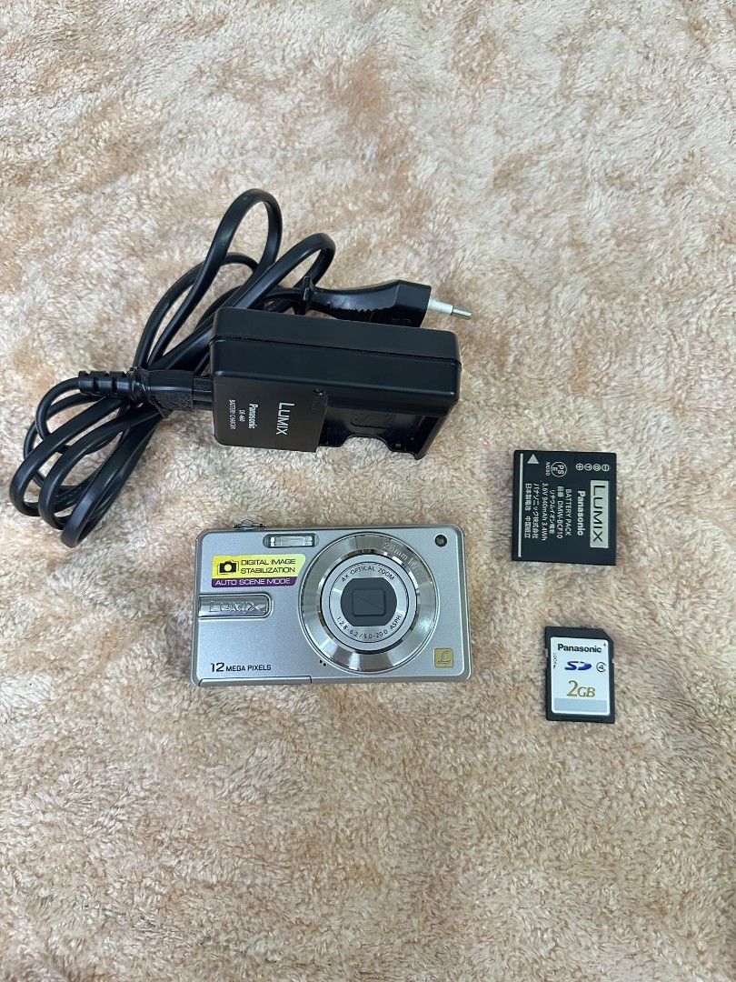 FS: PANASONIC LUMIX DMC F3 (silver) (Category: Cameras) located in Abucay. Submitted by raizenn. (Listing ID 1421246141, Image 1). Description: - 12 MP - all functions working - 8/10 cosmetics with signs of use - no issue - no sd card( already full need to change) Inclusions: unit battery charger wrist strap.