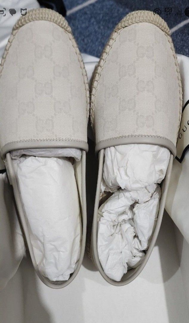 Gucci Espadrilles Size 37 (Category: Flats & Sandals) located in Manila. Submitted by microus (Listing ID 1421162848, Image 1). Description: - Authentic Gucci espadrilles - Size 37 - Iconic GG monogram pattern - Beige canvas upper - Woven sole - Gucci logo visible on insole and sole - Unworn condition - Comes with original box.