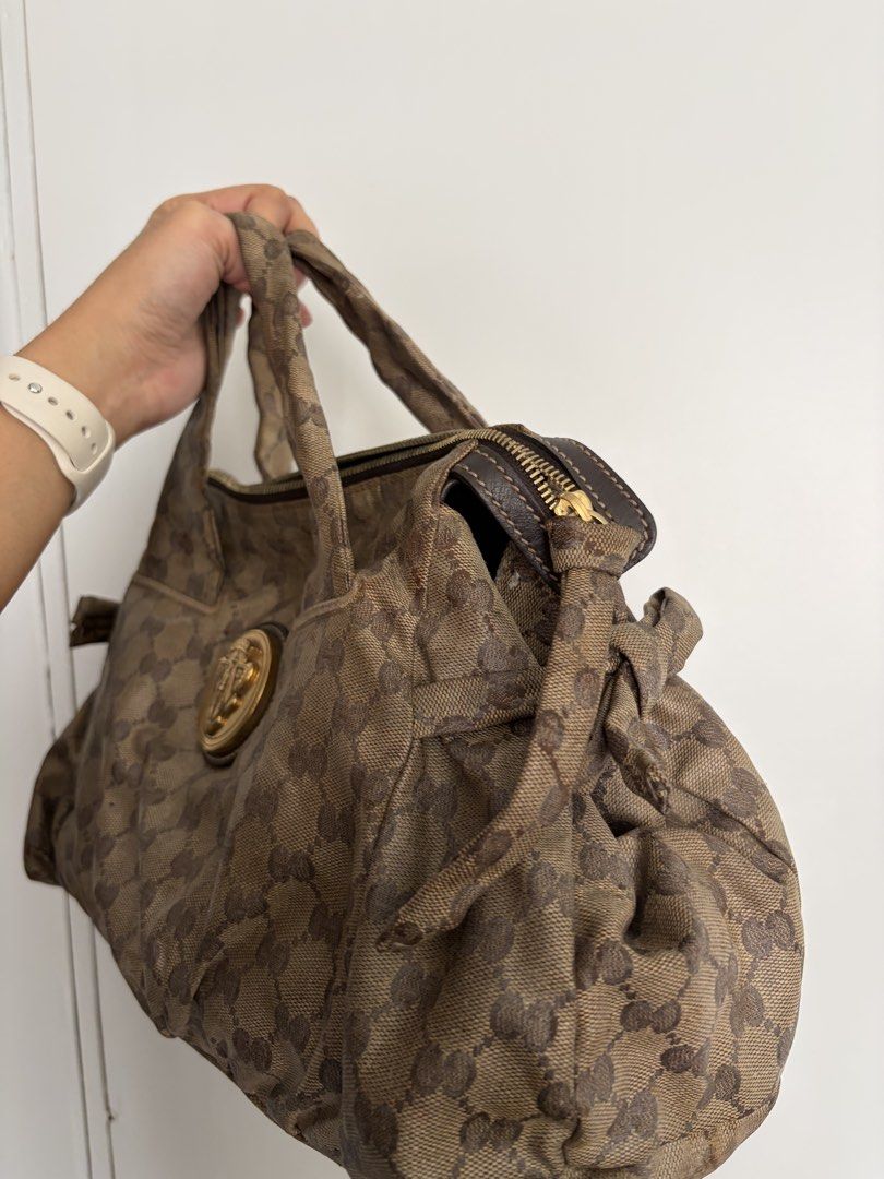 Gucci GG Hysteria Handbag (Category: Luxury Bags & Wallets) located in Makati City. Submitted by lenyfelix (Listing ID 1421194978, Image 3). Description: - Authentic Gucci handbag - Iconic GG canvas pattern - Zip closure - Gold-tone emblem - Leather-lined interior - Includes dust bag and Gucci paper bag - sticky na siya from cause of heat from storage - good for project bag.