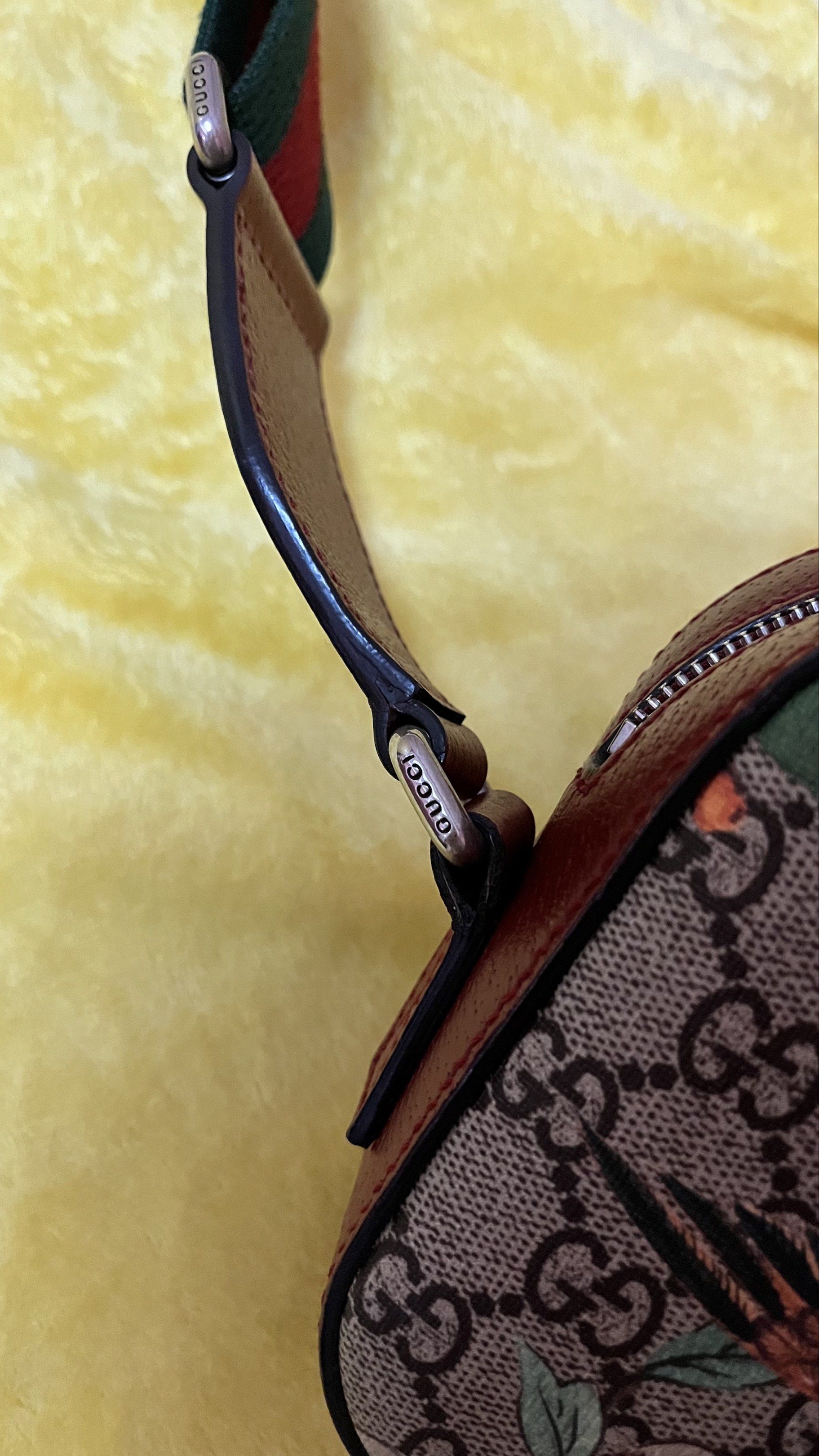 Gucci GG Supreme Tian Small Camera Bag (Category: Luxury Bags & Wallets) located in Bulacan. Submitted by jenairafrancine (Listing ID 1421182890, Image 3). Description: - Authentic Gucci crossbody bag - Floral print design - Red leather interior and exterior trim - Green and red striped strap with shoulder pad - Zipper closure - Gucci logo on hardware and interior - Made in Italy.