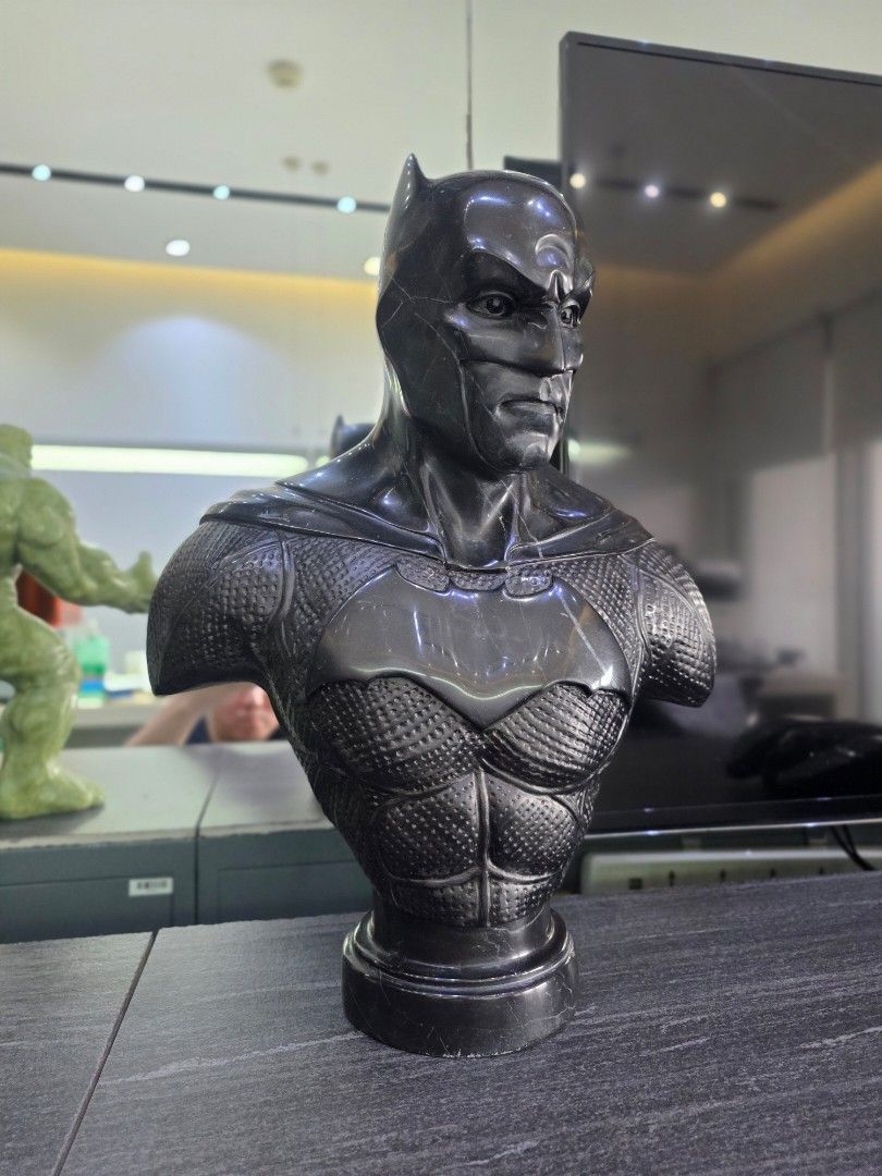 Hand Carved Batman Bust Statue in Solid Nero Marquina Marble (Category: Figurines & Statues) located in Mandaluyong City. Submitted by lbear29 (Listing ID 1421129475, Image 1). Description: Hand carved from a single block of marble with exceptional details - Collector's item - One of a kind Marble fan art - Batman bust statue - Features a detailed design of Batman's suit and cowl - Depicts the head and upper torso - Presented on a round base - Pe