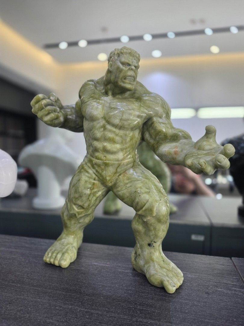 Hand Carved Hulk Statue in Solid Jade Green Marble (Category: Vintage Collectibles) located in Mandaluyong City. Submitted by lbear29 (Listing ID 1421128878, Image 1). Description: Hand carved from a single block of marble with exceptional details - Collector's - One of a kind Marble fan art - Hulk statue in a dynamic pose - Detailed muscle definition - Intricate facial expression - Perfect for display Size: 16" x 14.5" Weight: 12.6 kg.