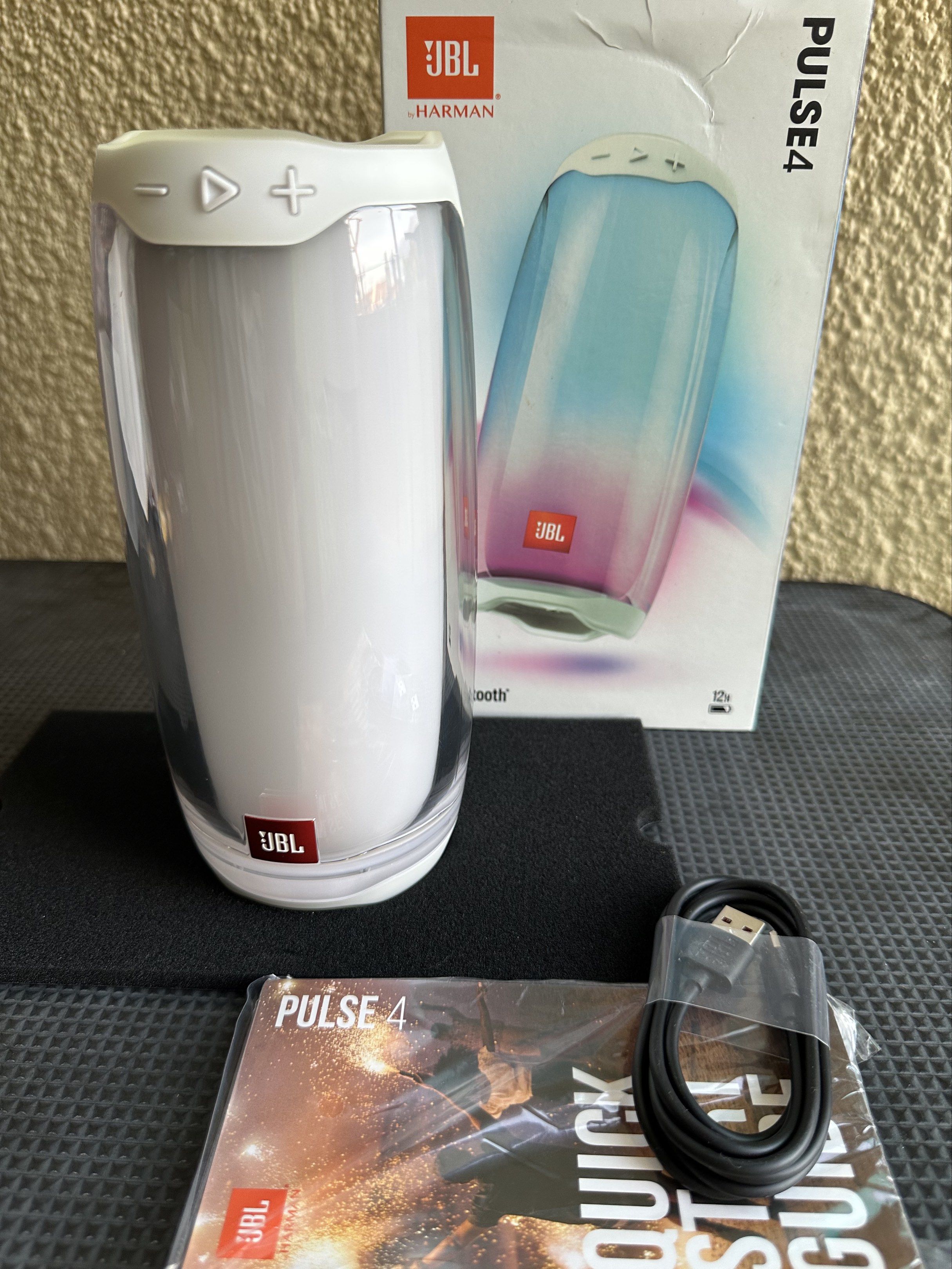 JBL Pulse 4 Bluetooth Speaker (Category: Soundbars, Speakers & Amplifiers) located in Paranaque City. Submitted by daluho.stuff (Listing ID 1421170989, Image 1). Description: - Original JBL Pulse 4 Bluetooth speaker - Includes original box - Comes with USB charging cable - Includes quick start guide - Features a unique light show - White color - Portable speaker - Bluetooth connectivity - JBL logo.