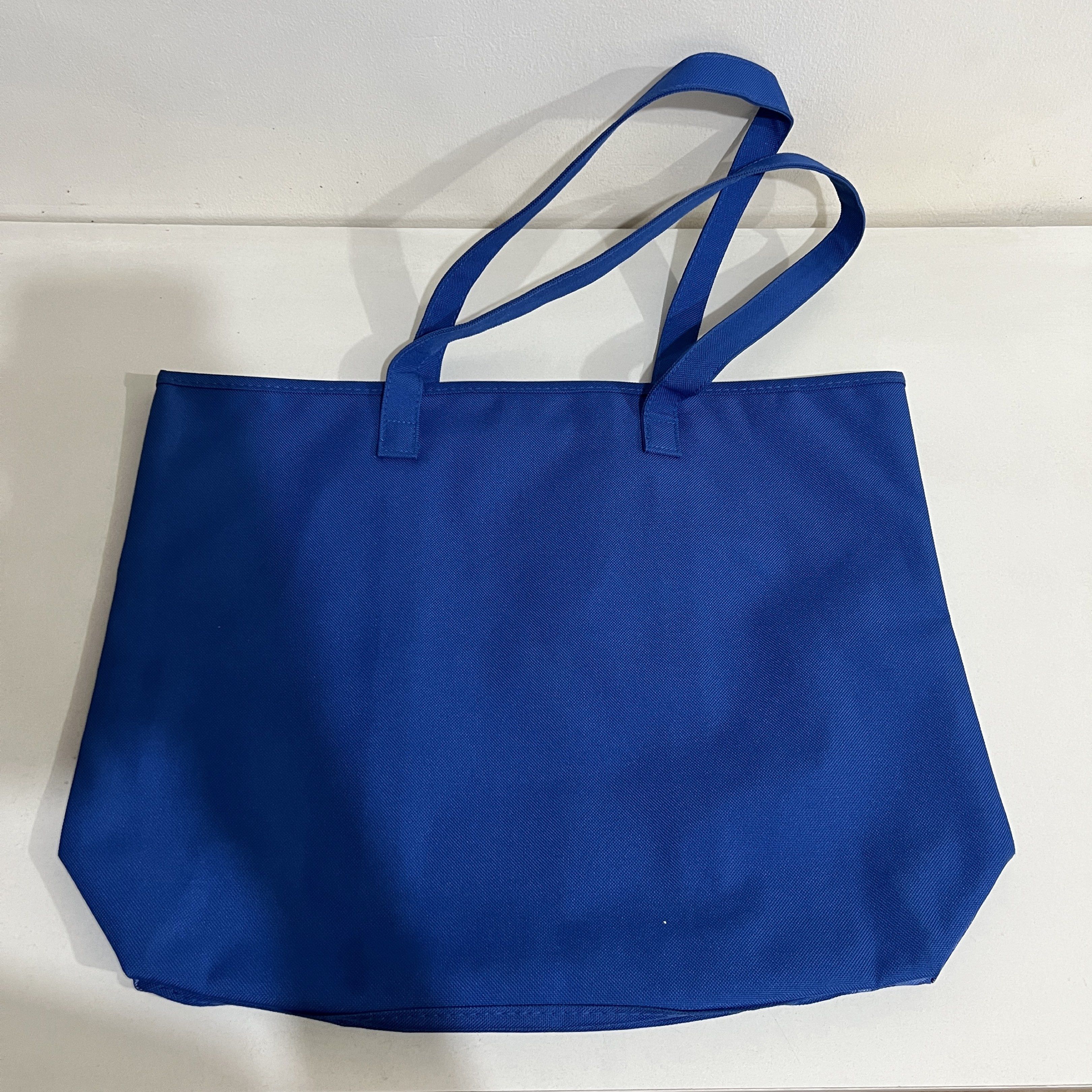 Lancome Paris Blue Tote Bag (Category: Tote Bags) located in Quezon City. Submitted by saayymm (Listing ID 1421250259, Image 2). Description: - Blue Paris-themed tote bag - Features images of the Eiffel Tower and Parisian landmarks - Durable material - Spacious interior - Two handles - Interior lining in a lighter shade of blue - Suitable for carrying various items.