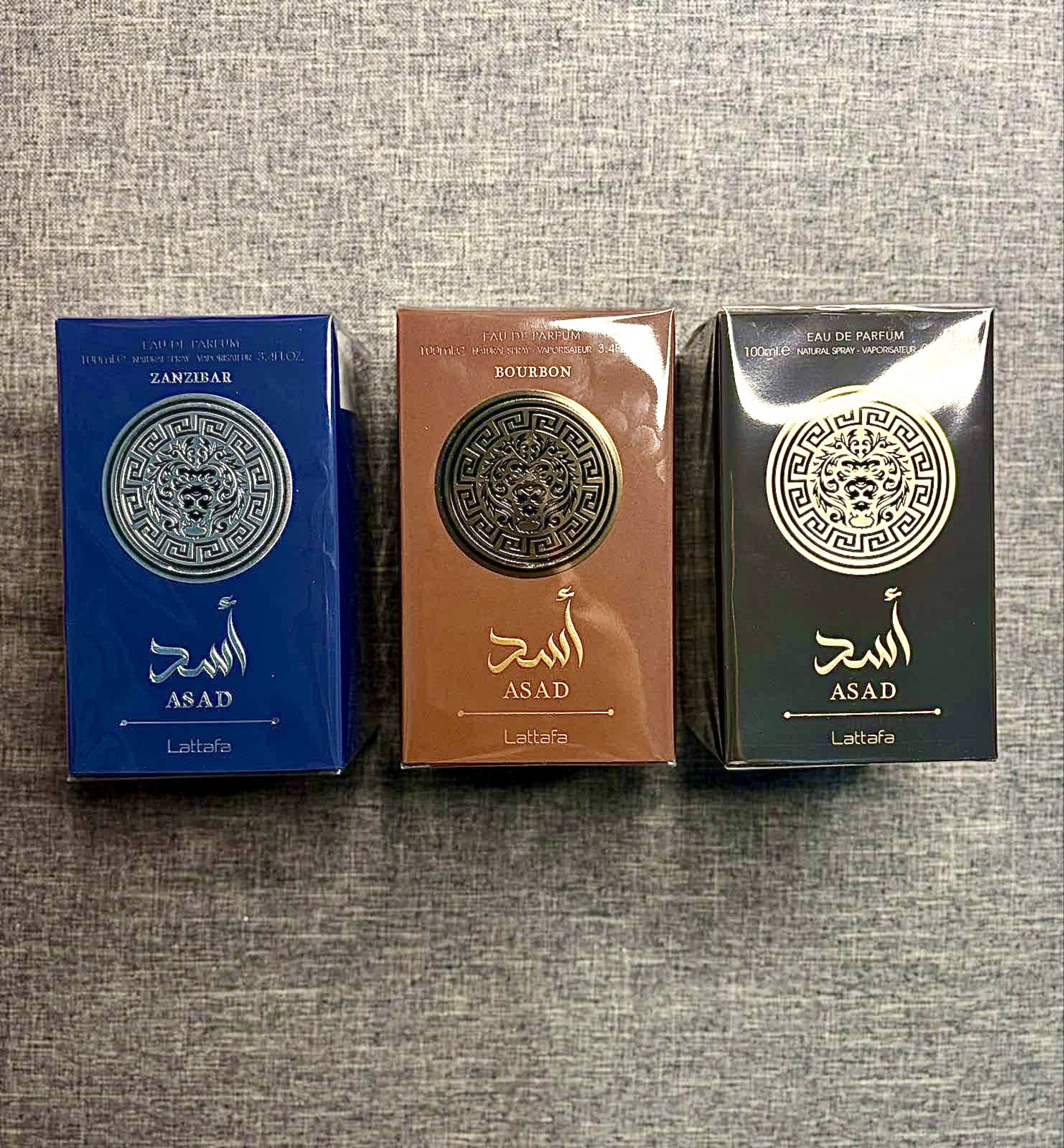 Lattafa Asad Zanzibar, Bourbon, and Black (Category: Fragrance & Deodorants) located in Paranaque City. Submitted by barbs24 (Listing ID 1421185785, Image 1). Description: - Lattafa Asad Perfumes available: Zanzibar, Bourbon, and Black variants. - All bottles are Eau de Parfum. - Brand new and sealed. - Comes in original packaging. - Ideal for gifting or adding to your fragrance collection..