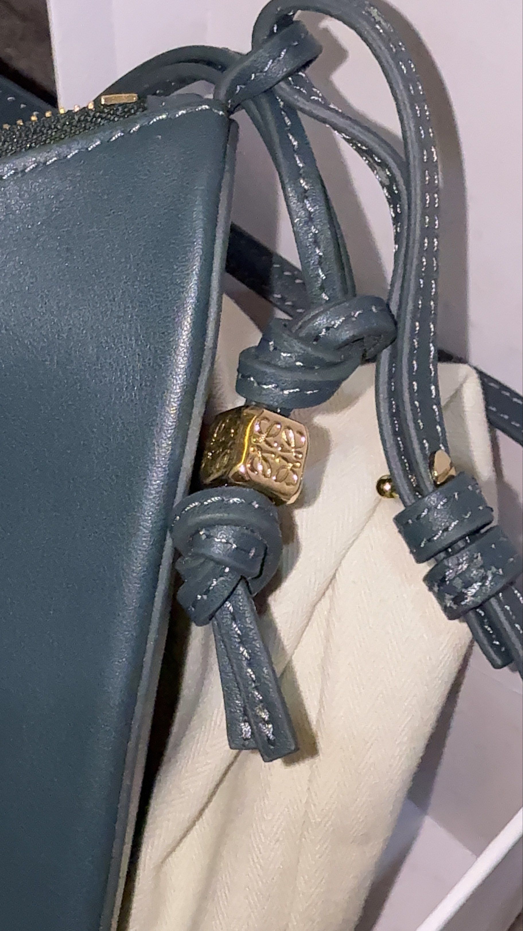 Loewe Small Hobo Bag (Category: Shoulder Bags) located in Cebu City. Submitted by refabph (Listing ID 1421161806, Image 2). Description: - LOEWE Mini Hammock Hobo Bag in classic calfskin - Teal color - Features a sleek design - Made with high-quality leather - Includes box - Stylish and versatile - Preloved/ second hand.