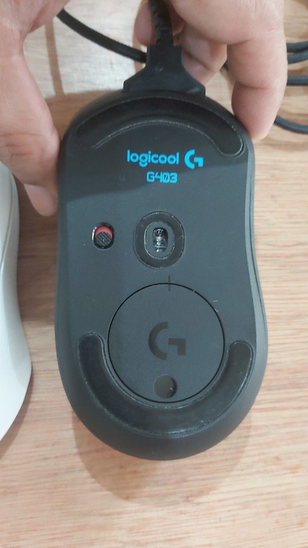 Logitech G403 Hero & Roccat Kone Pro (Category: Mouse & Mousepads) located in Naga. Submitted by kenshin78 (Listing ID 1421172997, Image 3). Description: - Logitech G403 Hero Gaming Mouse - Black color - Wired connection - In good working condition - Roccat Kone Pro Gaming Mouse - White color - as is condition.. no dongle use as bluetooth only - middle scroll not working .