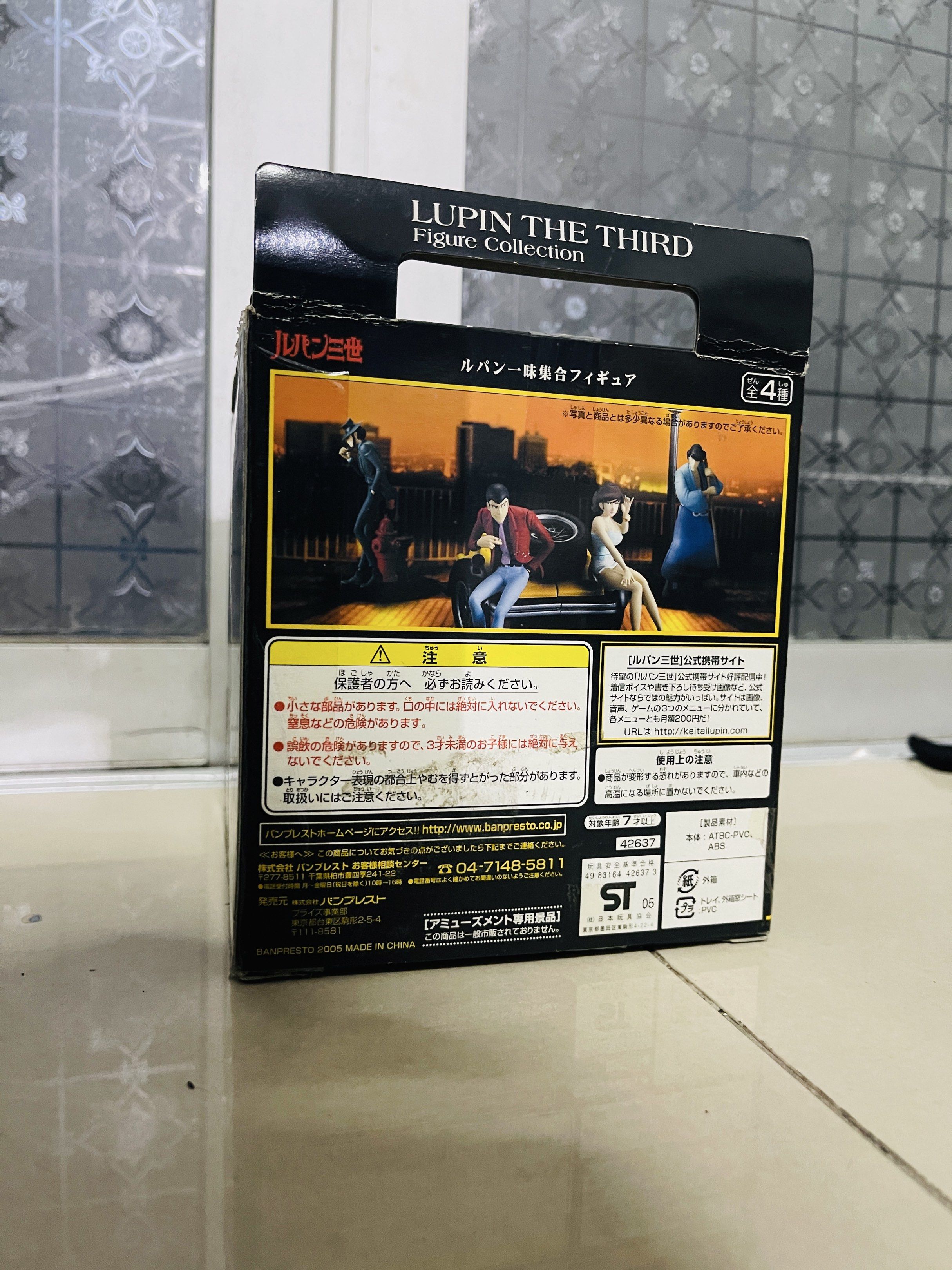 Lupin the Third Figure Collection (Category: Figurines & Statues) located in Caloocan City. Submitted by theoverstock101 (Listing ID 1421236982, Image 3). Description: Lupin the Third figure from the Figure Collection. The figure features Lupin sitting infront of yellow car. The box shows other characters from the series. The box has some wear and tear. The figure is still sealed inside the box..