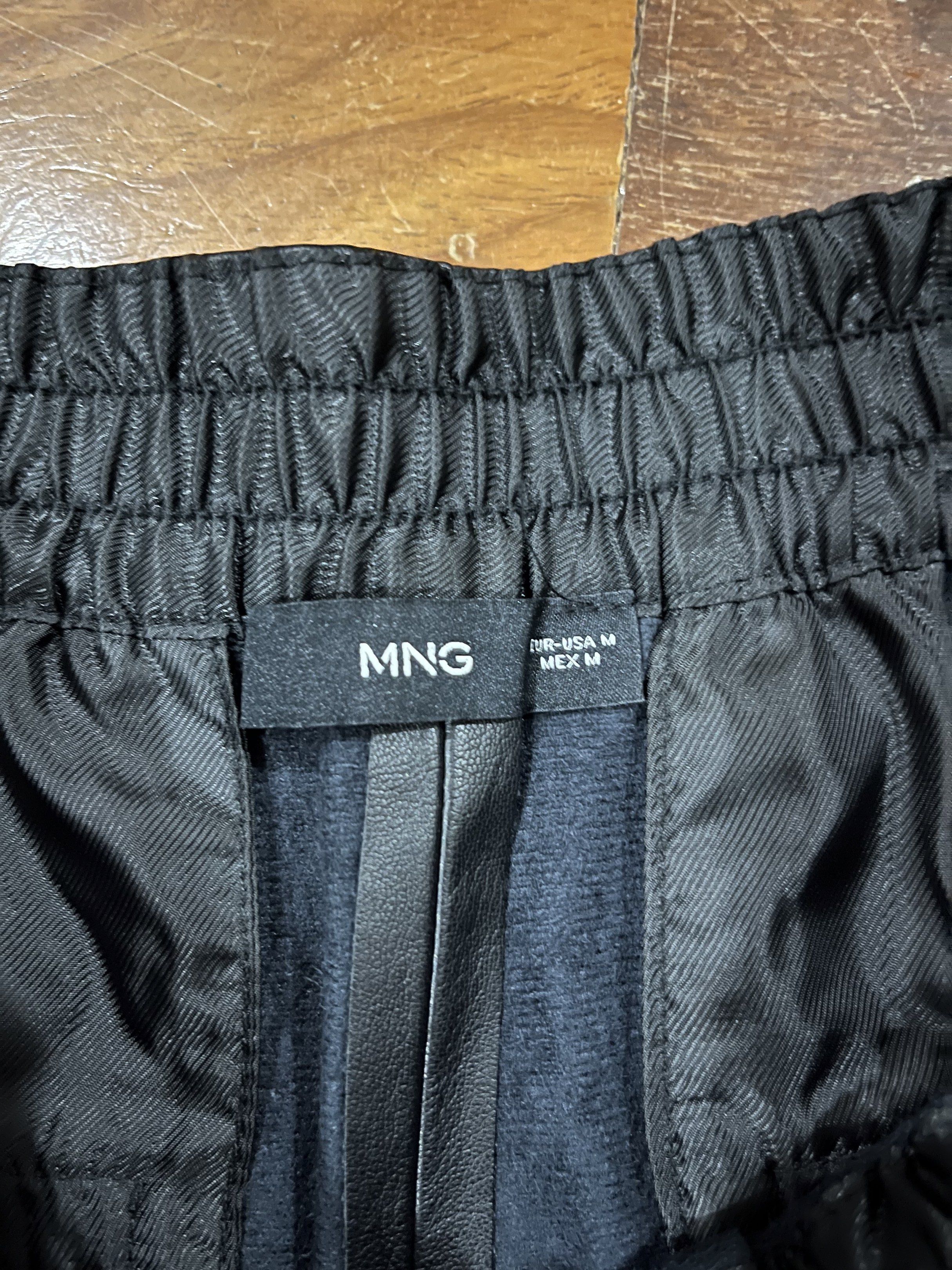 Mango Faux Leather Shorts - Size M (Category: Shorts) located in Paranaque City. Submitted by nikkis100 (Listing ID 1421258259, Image 3). Description: - Mango black faux leather shorts - Size: M - Used 3 times - Features an elastic waistband - Includes two back pockets - Perfect for casual or dressy outfits - Comfortable and easy to wear RFS: I don’t get to use it often .