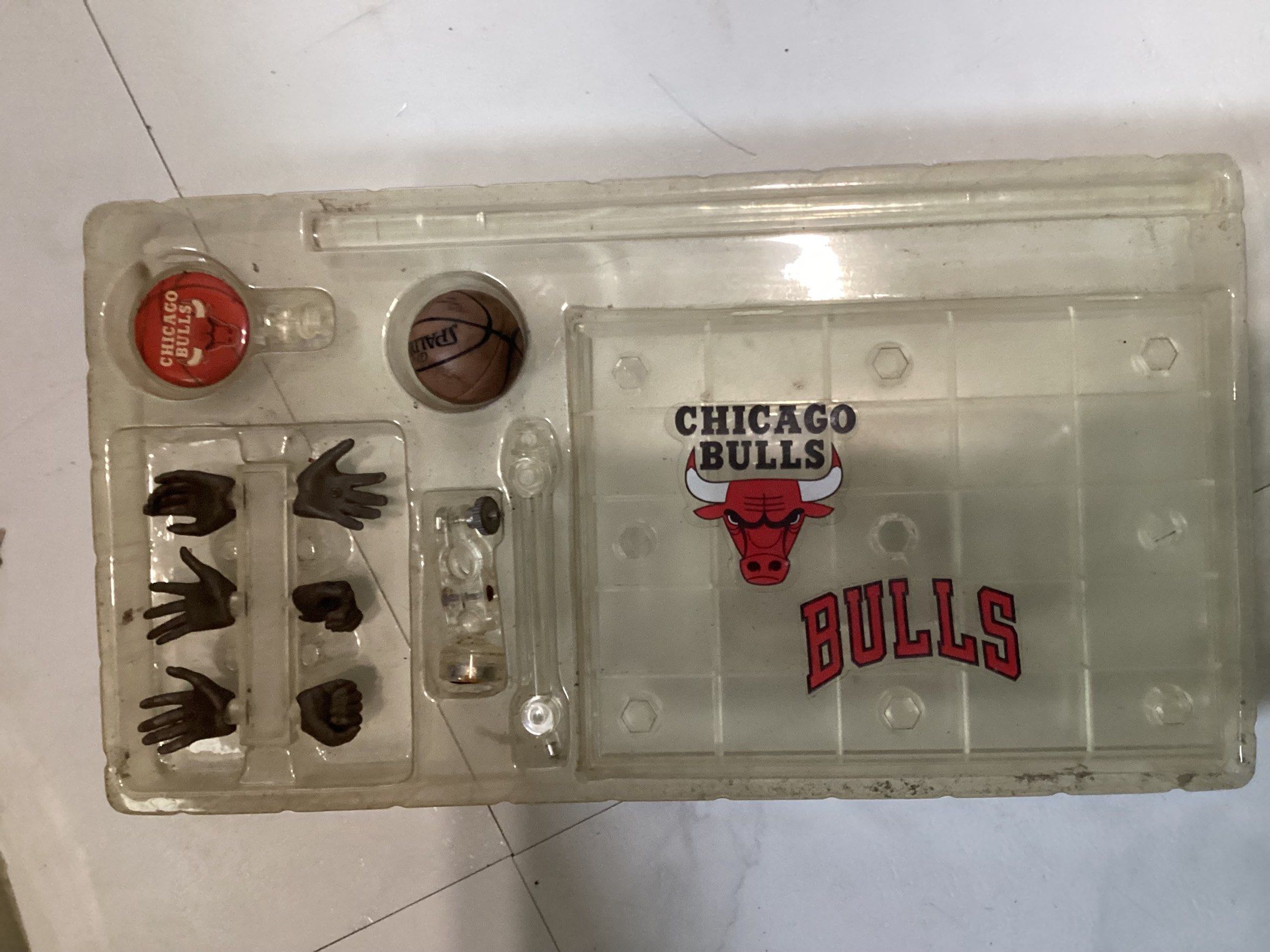 Michael Jordan Chicago Bulls Action Figure (Category: Figurines & Statues) located in Manila. Submitted by cozenn (Listing ID 1421147928, Image 3). Description: - Michael Jordan action figure - Chicago Bulls uniform (Number 23) - Includes interchangeable hands - Comes with a basketball - Features a Chicago Bulls logo - Includes a stand - In original packaging.