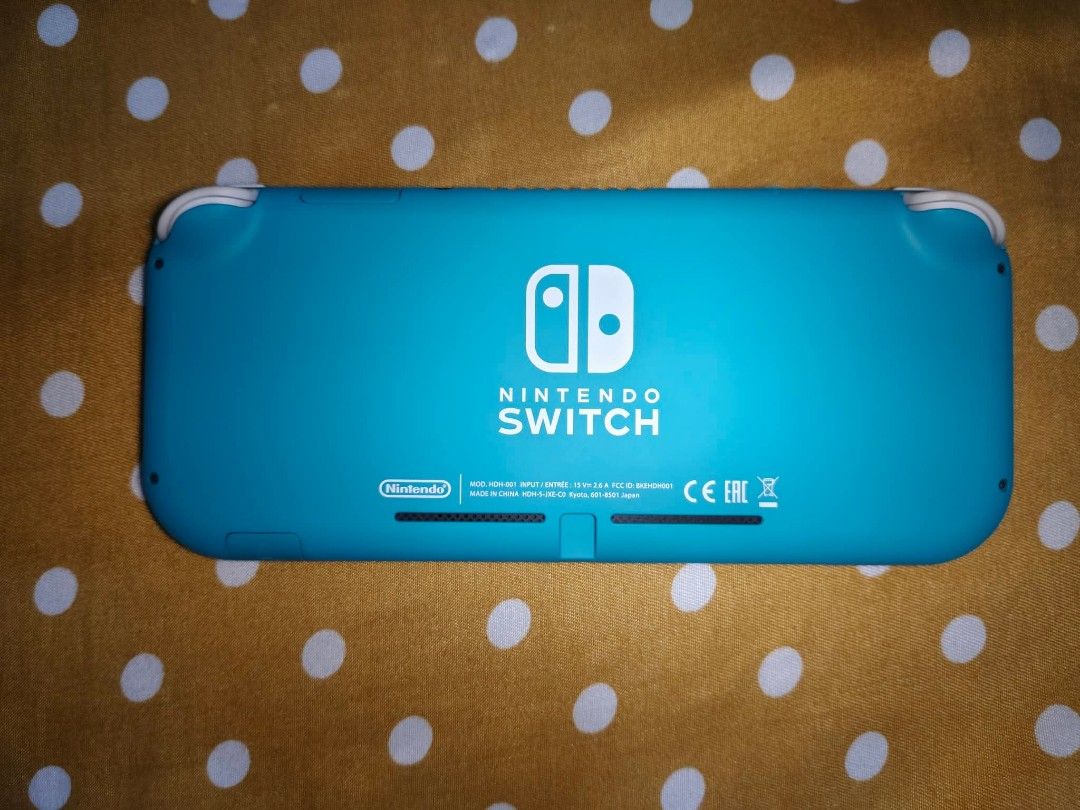 Nintendo Switch Lite - Turquoise (Category: Nintendo) located in Caloocan City. Submitted by kielaldrei26326 (Listing ID 1421118883, Image 2). Description: Turquoise Nintendo Switch Lite. Inclusions: Portable Bag Case Charger connector 128gb Memory Card.