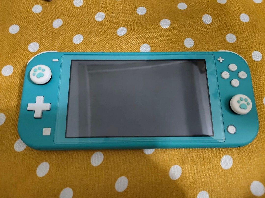 Nintendo Switch Lite - Turquoise (Category: Nintendo) located in Caloocan City. Submitted by kielaldrei26326 (Listing ID 1421118883, Image 1). Description: Turquoise Nintendo Switch Lite. Inclusions: Portable Bag Case Charger connector 128gb Memory Card.