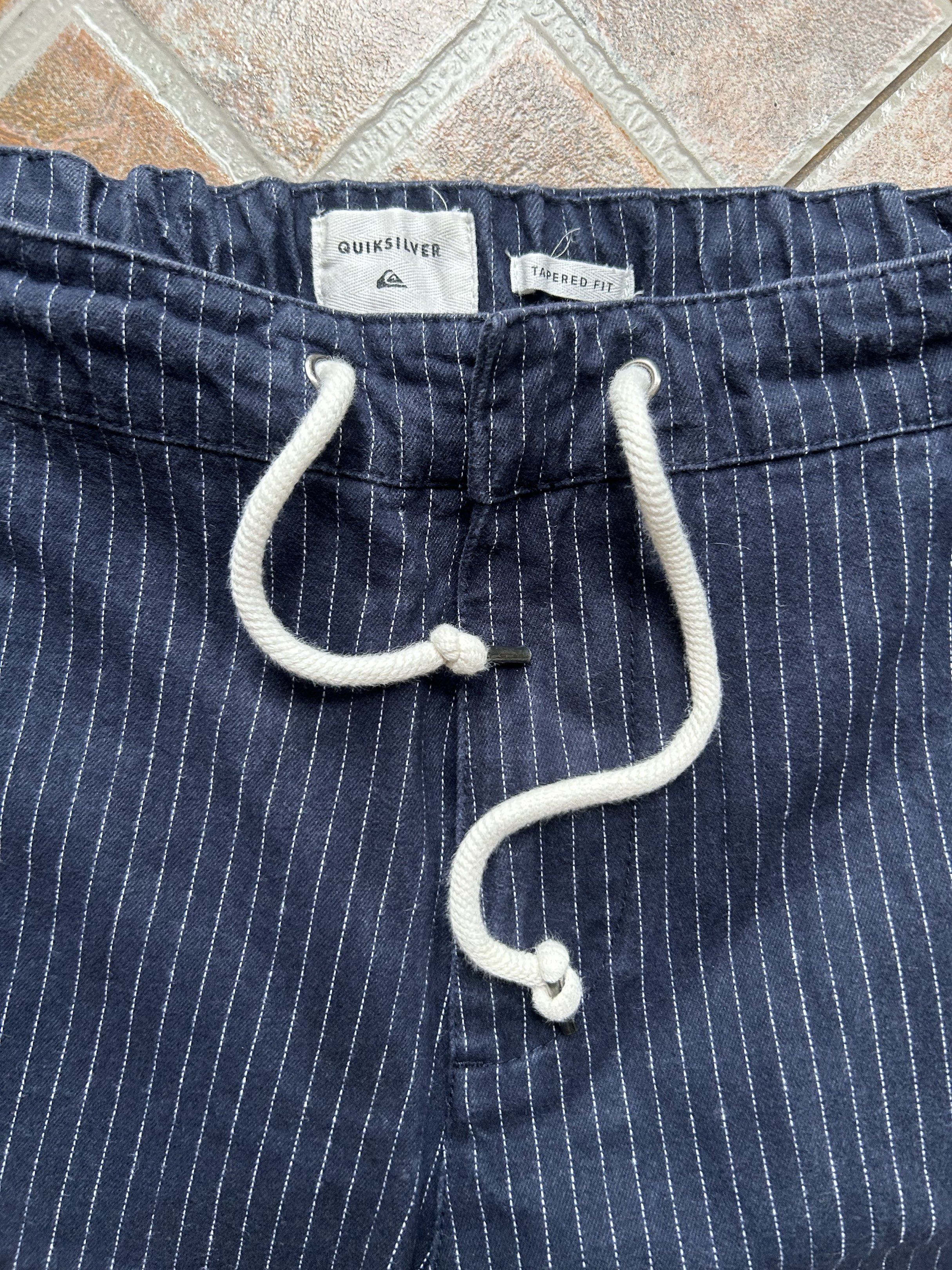 Quiksilver Tapered Fit Striped Pants (Category: Jeans) located in Quezon City. Submitted by stokedx.x (Listing ID 1421196921, Image 2). Description: - Quiksilver tapered fit pants - Navy blue with white stripes - Drawstring waist - Two back pockets Fits 30-32 .