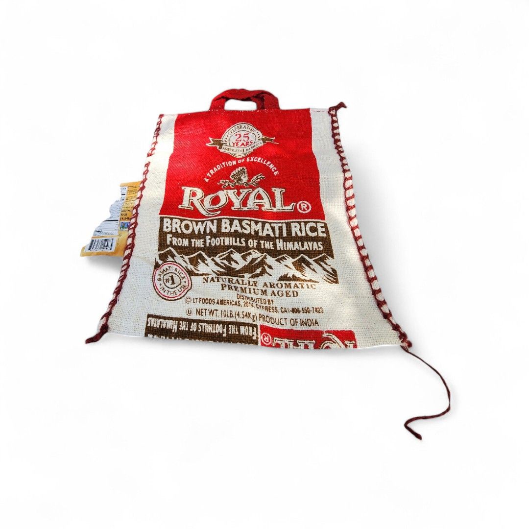 Royal Brown Basmati Rice (Category: Rice & Noodles) located in Suyo. Submitted by xtrexxxxha (Listing ID 1421165885, Image 1). Description: - Royal Brown Basmati Rice - Naturally aromatic - Premium aged - Net weight: 18 lbs (8.16 kg) - Product of India - Convenient handle for carrying.