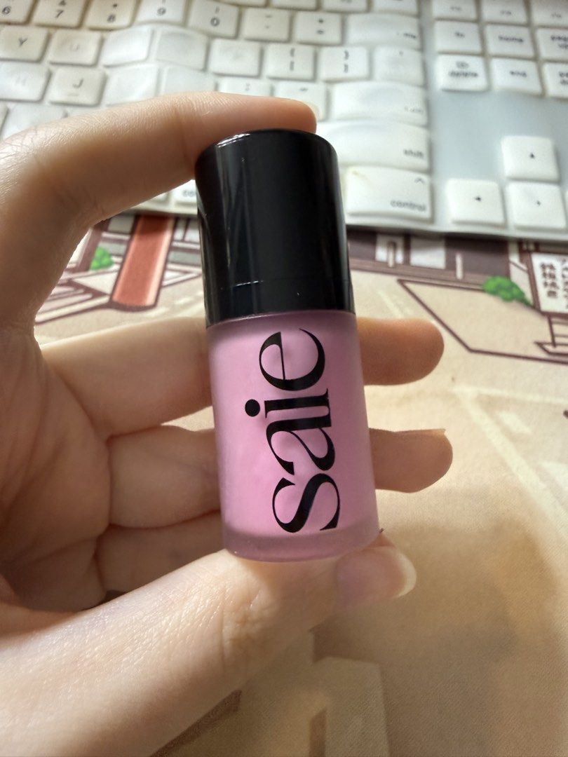 Saie Dew Blush - Baby (Category: Makeup) located in Cabanatuan. Submitted by makeup_goodies (Listing ID 1421221957, Image 1). Description: - Saie Dew Blush in Baby shade - Beautiful pink color - Comes in a sleek, cylindrical container - Features a black cap - Authentic Saie product SWATCHED ONLY.