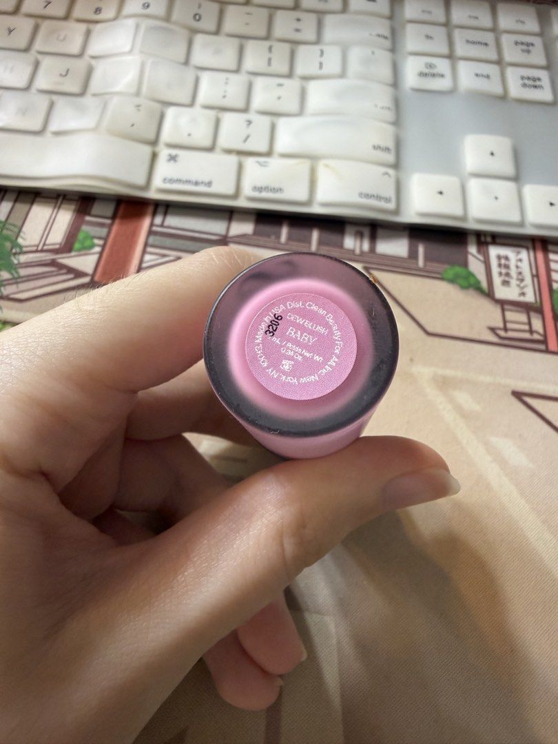 Saie Dew Blush - Baby (Category: Makeup) located in Cabanatuan. Submitted by makeup_goodies (Listing ID 1421221957, Image 2). Description: - Saie Dew Blush in Baby shade - Beautiful pink color - Comes in a sleek, cylindrical container - Features a black cap - Authentic Saie product SWATCHED ONLY.