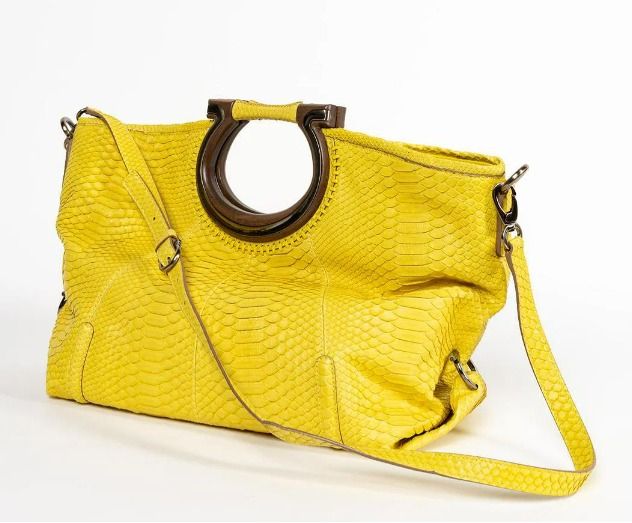 NEGOTIABLE! Salvatore Ferragamo Python Fiammetta Shoulder Bag Spring/Summer Coll 2010 (Category: Luxury Bags & Wallets) located in Cainta. Submitted by ahyish (Listing ID 1421164538, Image 2). Description: - Bright yellow leather handbag - Unique wooden handle - Detachable shoulder strap - Textured, snakeskin-like pattern - Silver-tone hardware - Spacious design - Suitable for everyday use .