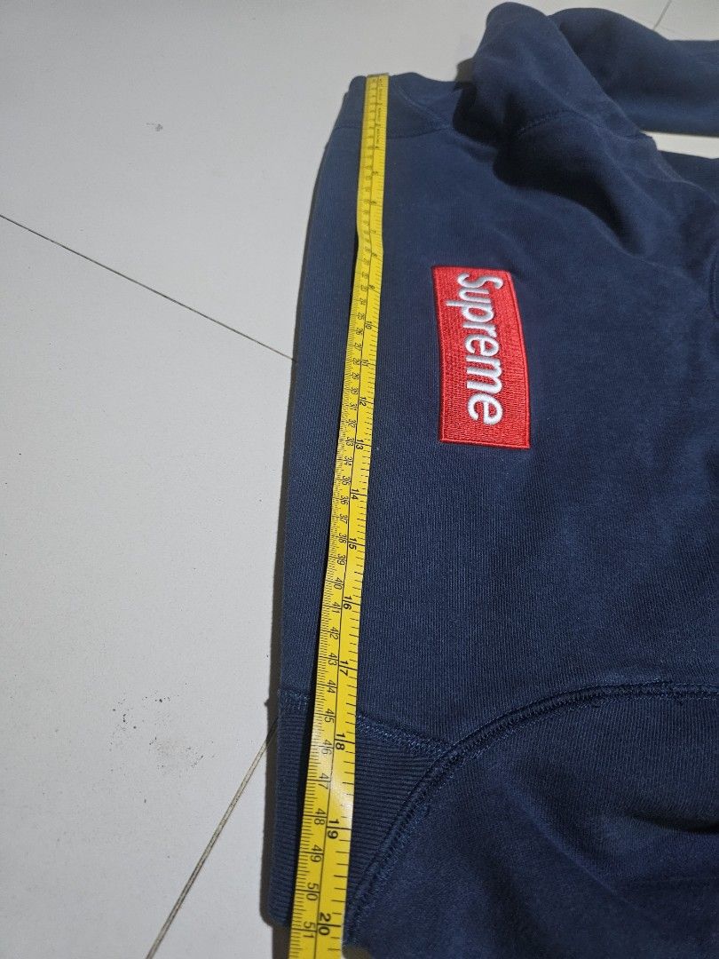 Supreme Box Logo Hoodie (Category: Hoodies) located in San Jose del Monte. Submitted by levanthrift (Listing ID 1421224463, Image 1). Description: - Navy blue Supreme hoodie - Red box logo - Hooded with front pocket - Bottom width: ~20 inches - Material: Thick cotton blend please check photos.