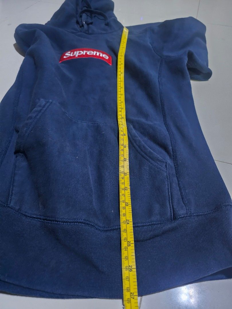 Supreme Box Logo Hoodie (Category: Hoodies) located in San Jose del Monte. Submitted by levanthrift (Listing ID 1421224463, Image 2). Description: - Navy blue Supreme hoodie - Red box logo - Hooded with front pocket - Bottom width: ~20 inches - Material: Thick cotton blend please check photos.