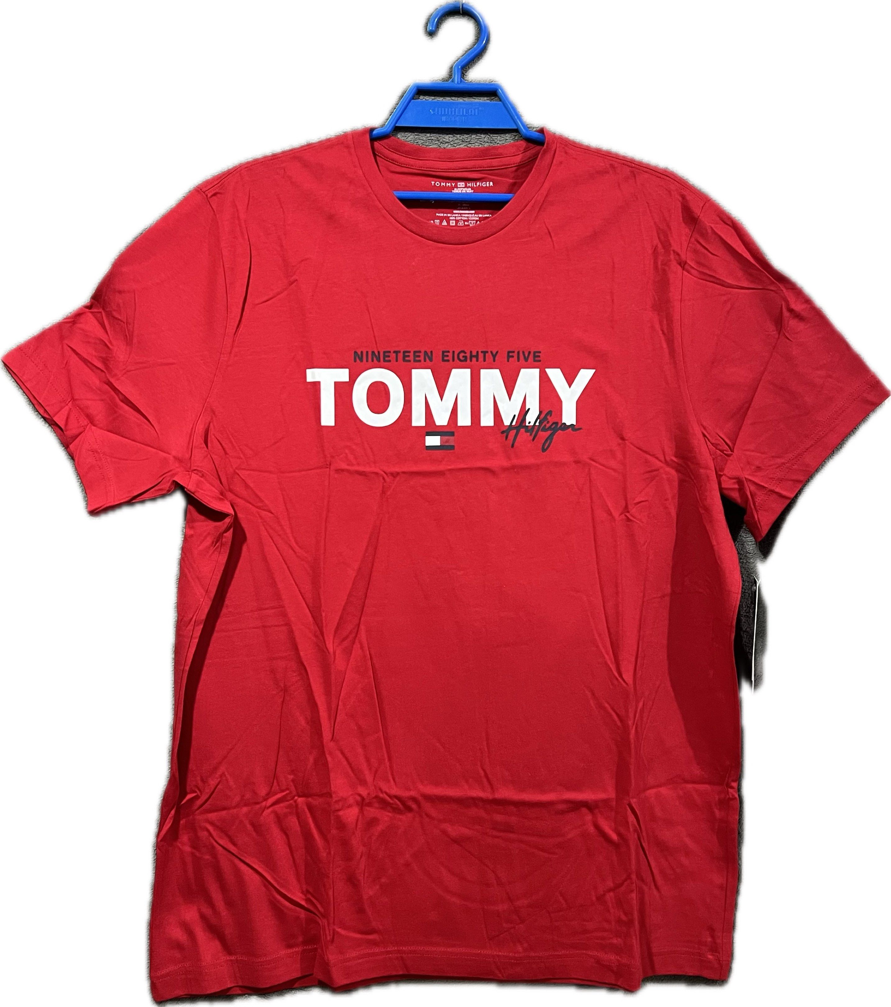 Tommy Hilfiger Red T-Shirt (Category: Tshirts & Polo Shirts ) located in Cebu City. Submitted by kwensy (Listing ID 1421184583, Image 1). Description: Minor stains may be present on some items due to long-term storage/folding. Size: US Large .