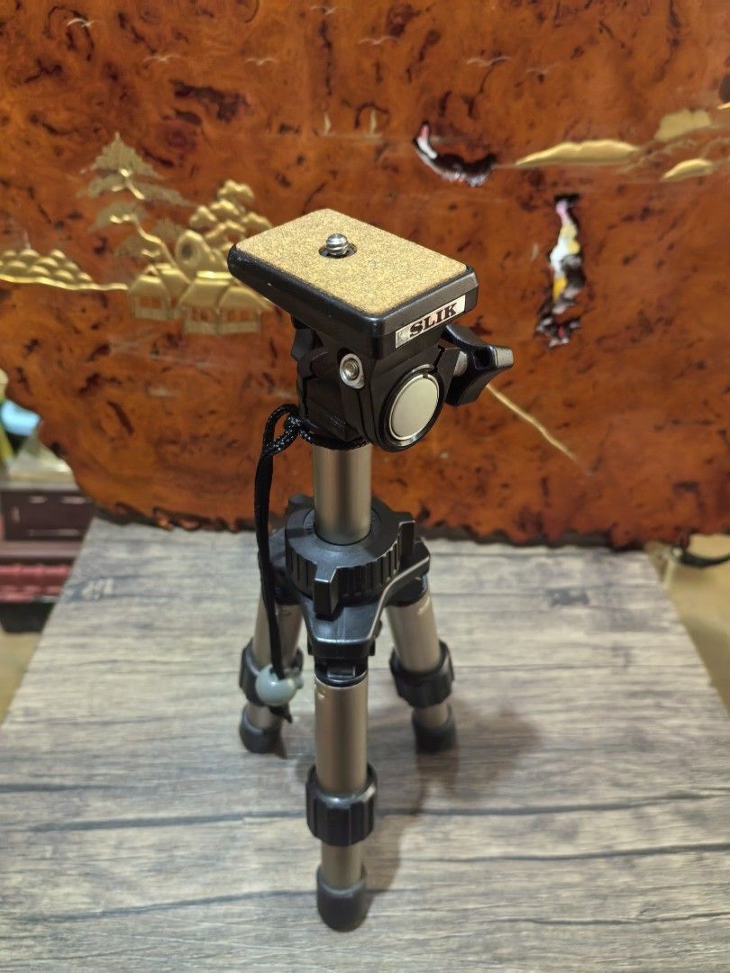 Tripod - SLIK Mini Series Table-top Camera Tripod (Category: Tripods & Monopods) located in Cebu City. Submitted by dudes_villanueva (Listing ID 1421137979, Image 3). Description: Tripod - SLIK Mini Series Table-top Camera Tripod 📌The tripod is compact and lightweight, designed to fit easily into a camera bag. 📌It is constructed from aluminum and plastic materials. 📌It features a 2-way pan head for easy camera positioning and a simple one-hand