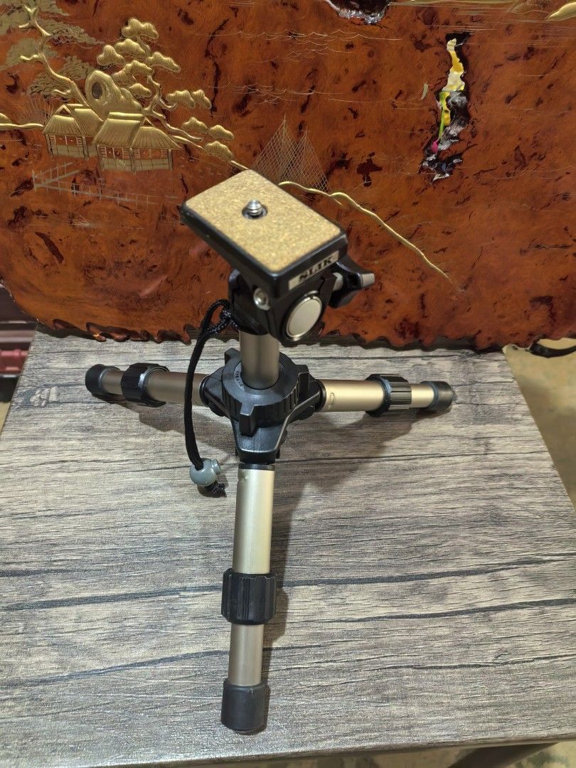 Tripod - SLIK Mini Series Table-top Camera Tripod (Category: Tripods & Monopods) located in Cebu City. Submitted by dudes_villanueva (Listing ID 1421137979, Image 1). Description: Tripod - SLIK Mini Series Table-top Camera Tripod 📌The tripod is compact and lightweight, designed to fit easily into a camera bag. 📌It is constructed from aluminum and plastic materials. 📌It features a 2-way pan head for easy camera positioning and a simple one-hand