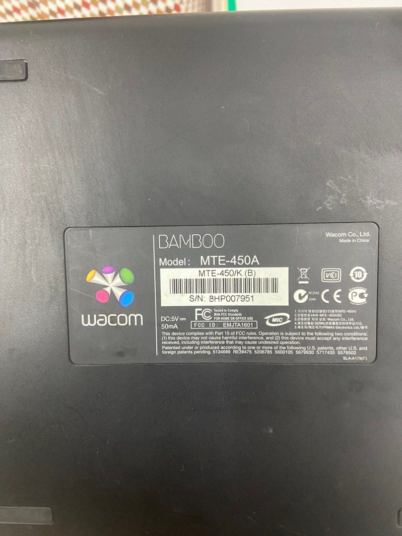 Wacom Bamboo MTE-450A/K Drawing Tablet (Category: Other Accessories) located in Quezon City. Submitted by thrifthive (Listing ID 1421186778, Image 2). Description: - Wacom Bamboo drawing tablet (MTE-450A/K). - Includes pen, USB cable, and pen stand. - Black surface with navigation dial and function buttons. - Ideal for digital art and creative work. - Compact and portable design..