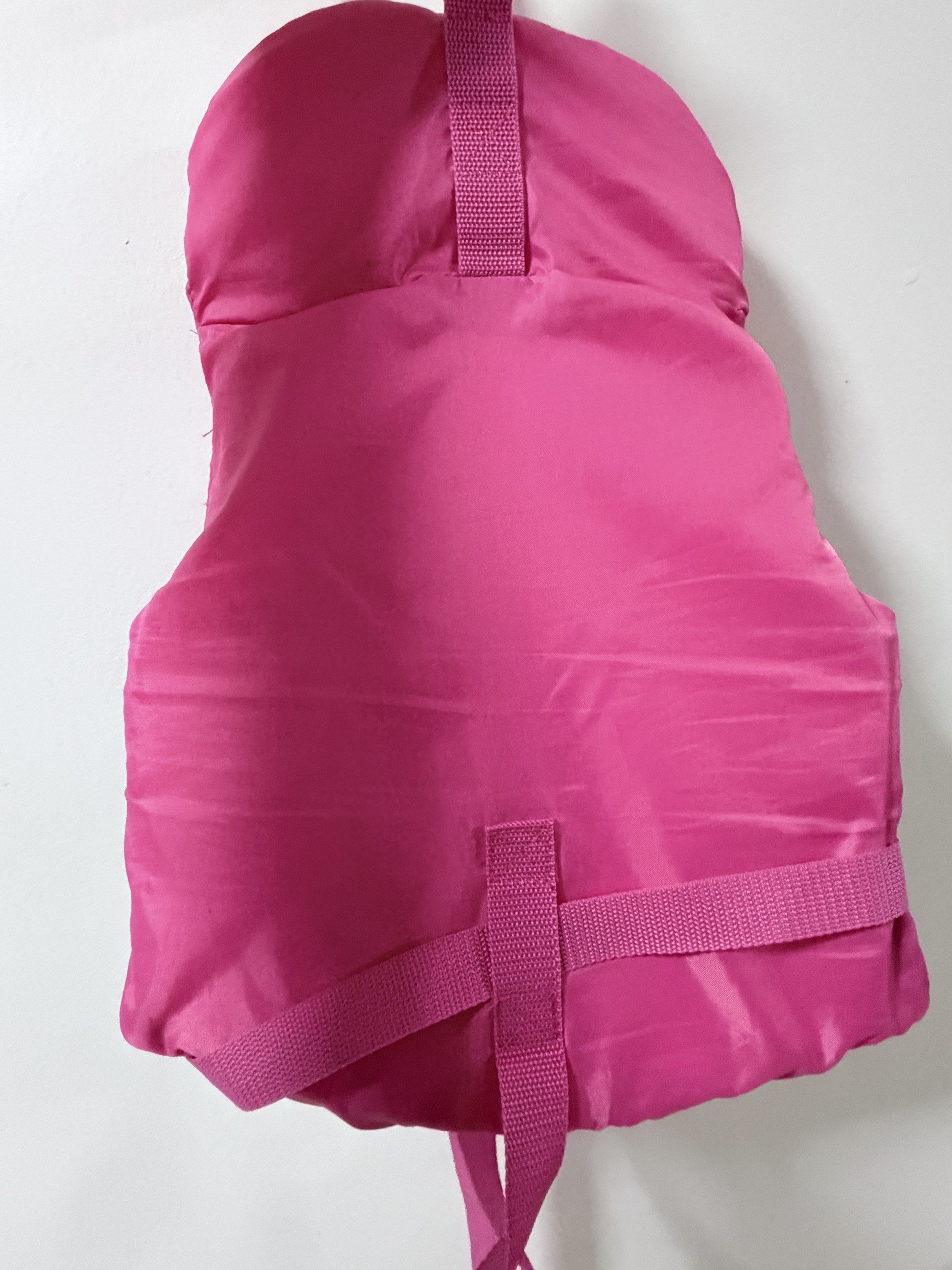 Winmax Pink Life Vest/Jacket for Toddlers (Category: Vests) located in Pasig City. Submitted by iammr.owl29 (Listing ID 1421143184, Image 2). Description: Item condition: - Winmax life vest for water activities. - Vibrant pink and purple color. - Secure zipper and adjustable straps. - Fun starfish and fish graphics. - Designed for buoyancy and safety. - Made of durable material. - Includes a loop for hanging. Disclaimers: ❕Actual color may vary d