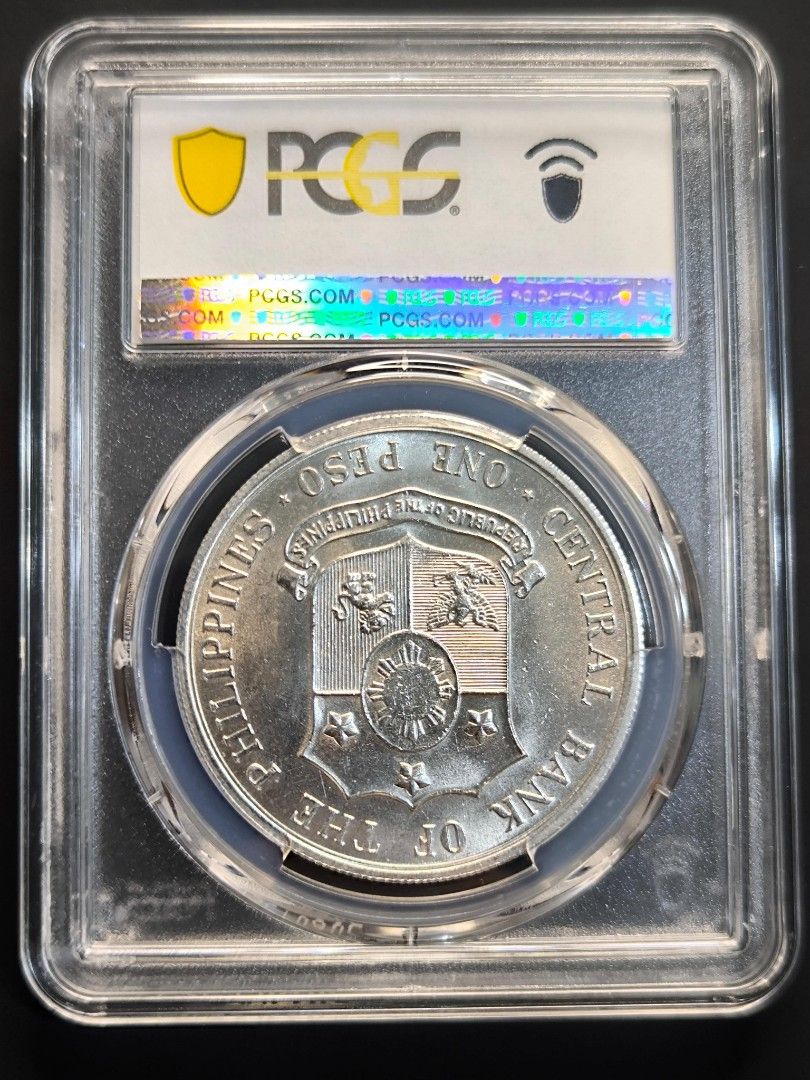 1964 Philippines Apolinario Mabini Centenary Silver Coin (Category: Currency) located in Paranaque City. Submitted by phcoincollective (Listing ID 1421322104, Image 2). Description: - 1964 Philippines Apolinario Mabini Centenary Silver Coin - Graded MS63 by PCGS - Features Apolinario Mabini on the obverse - Features the Central Bank of the Philippines seal on the reverse - Comes in a protective holder.