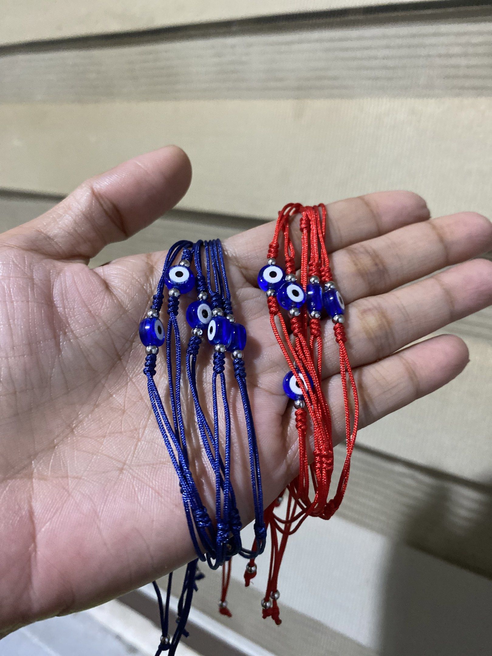 6mm Evil Eye Bracelet (stainless beads spacer) (Category: Bracelets) located in General Trias. Submitted by artycles (Listing ID 1420076328, Image 3). Description: - Features two round evil eye charms. - Dark blue cord. - Adjustable bracelet. - Simple and elegant design..
