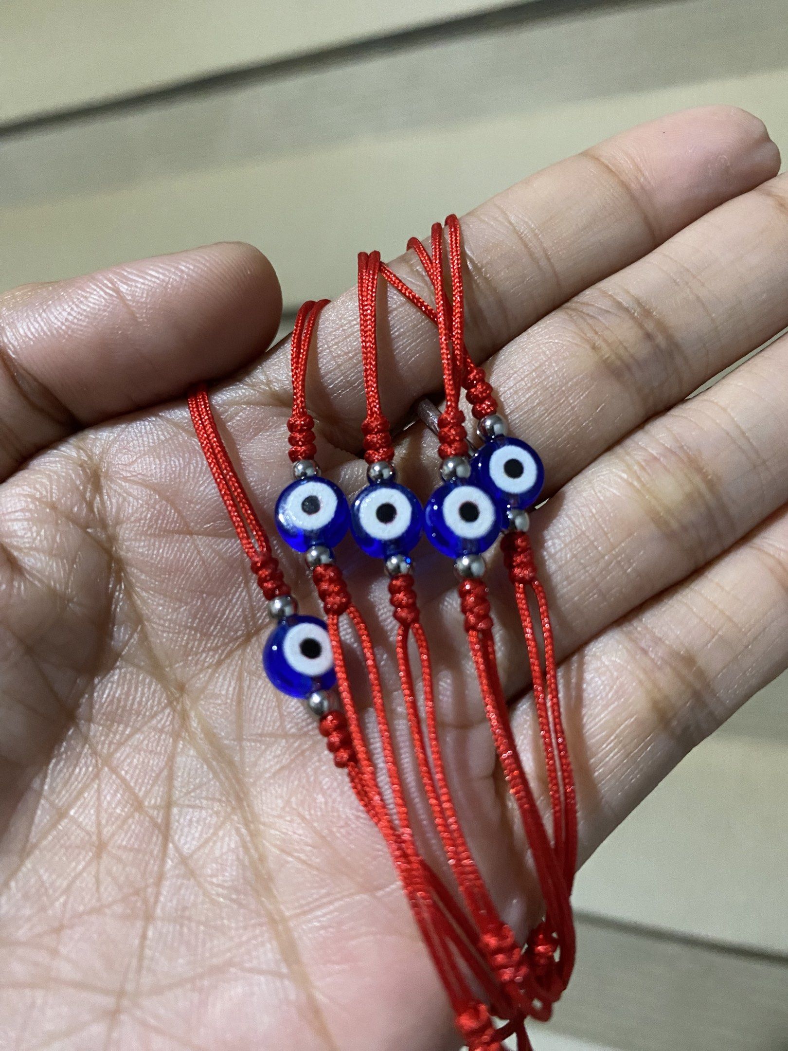 6mm Evil Eye Bracelet (stainless beads spacer) (Category: Bracelets) located in General Trias. Submitted by artycles (Listing ID 1420076328, Image 2). Description: - Features two round evil eye charms. - Dark blue cord. - Adjustable bracelet. - Simple and elegant design..
