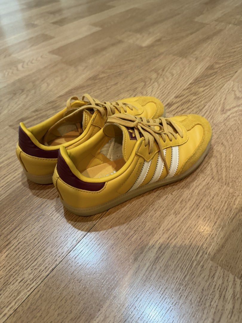 Adidas Samba OG Yellow Sneakers original (Category: Sneakers) located in Pasig City. Submitted by fz718 (Listing ID 1421338055, Image 3). Description: - Adidas Samba OG sneakers - Yellow with white stripes - Yellow suede toe cap - Burgundy heel tab - Yellow laces - Gum sole - Adidas logo on tongue.