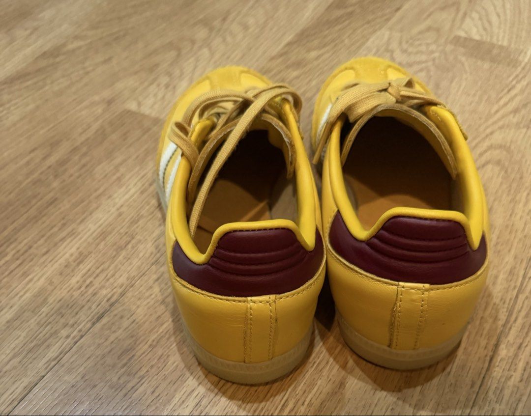 Adidas Samba OG Yellow Sneakers original (Category: Sneakers) located in Pasig City. Submitted by fz718 (Listing ID 1421338055, Image 2). Description: - Adidas Samba OG sneakers - Yellow with white stripes - Yellow suede toe cap - Burgundy heel tab - Yellow laces - Gum sole - Adidas logo on tongue.