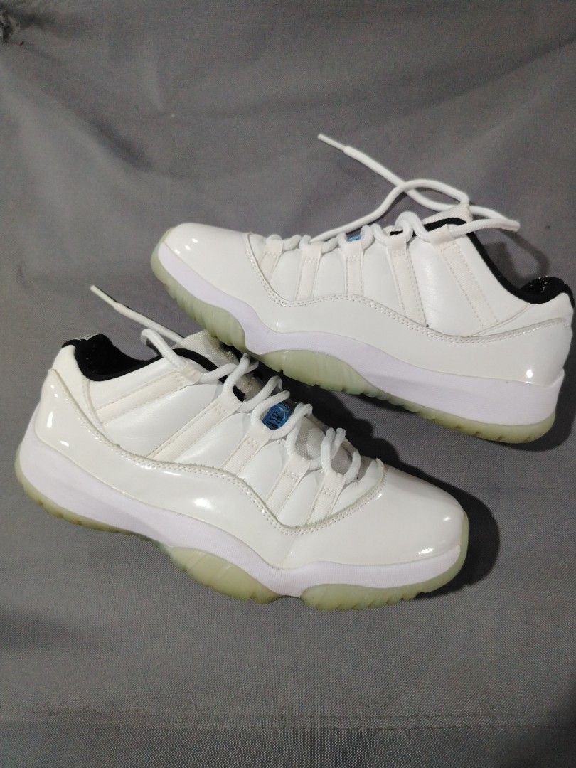 Air Jordan 11 Retro White/Legend Blue (Category: Sneakers) located in Midsalip. Submitted by shoesselector (Listing ID 1421393604, Image 1). Description: - Air Jordan 11 Retro - Colorway: White and Legend Blue - Features a white upper with patent leather overlay - Translucent outsole - Jumpman logo on the heel - Size: US 10 - Condition: Good.