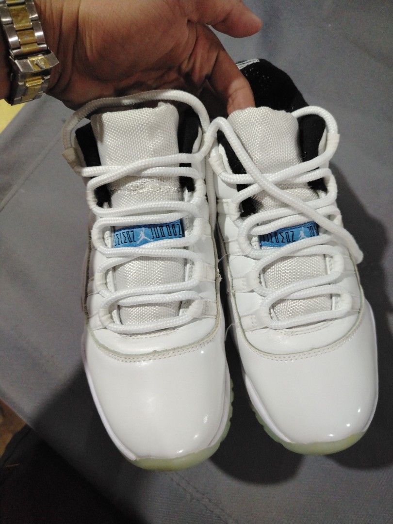 Air Jordan 11 Retro White/Legend Blue (Category: Sneakers) located in Midsalip. Submitted by shoesselector (Listing ID 1421393604, Image 2). Description: - Air Jordan 11 Retro - Colorway: White and Legend Blue - Features a white upper with patent leather overlay - Translucent outsole - Jumpman logo on the heel - Size: US 10 - Condition: Good.