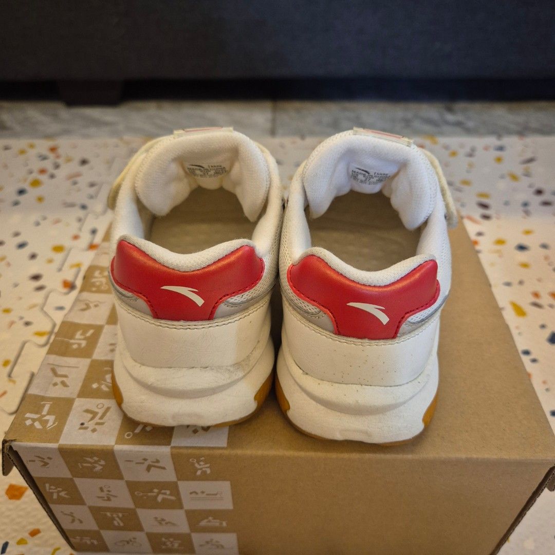 ANTA Kids Shoes Size 27 (Category: Babies & Kids Fashion) located in Paranaque City. Submitted by everydaymonday (Listing ID 1421362683, Image 2). Description: - ANTA kids shoes - Size 27 (US 10C) - Stylish white and gray design with red accents - Convenient velcro strap for easy wear - Comfortable cushioned sole - Includes original box.