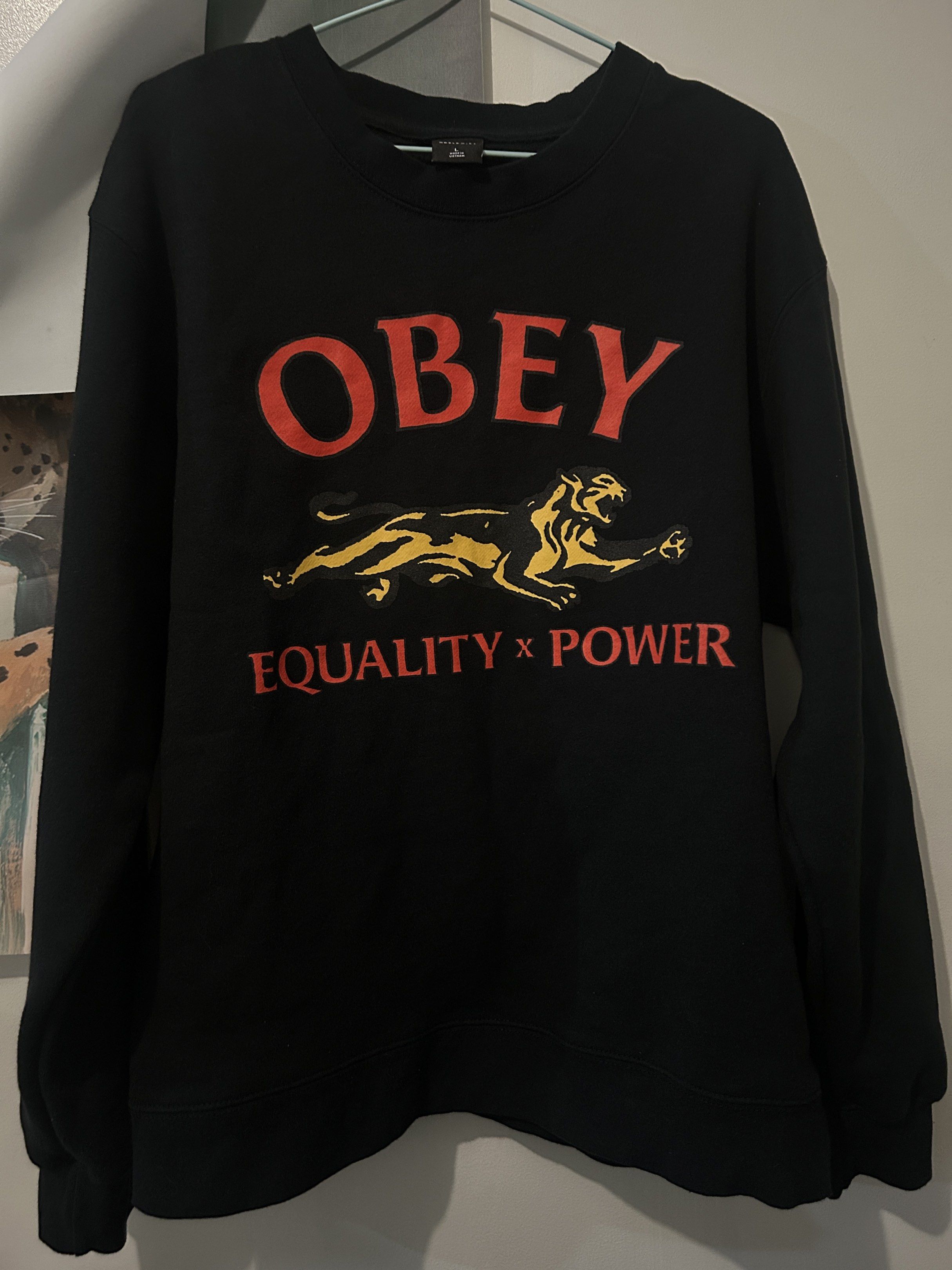 ALMOST NEW AUTHENTIC Obey Equality x Power Sweatshirt - Black (Category: Coats, Jackets and Outerwear) located in Cainta. Submitted by pepperidge7519 (Listing ID 1421420572, Image 1). Description: - AUTHENTIC Obey Equality x Power Sweatshirt - Color: Black - Size: L - Features the iconic Obey logo and Equality x Power graphic - Made with a blend of cotton and polyester Like New. Used twice only Unisex Authentic.