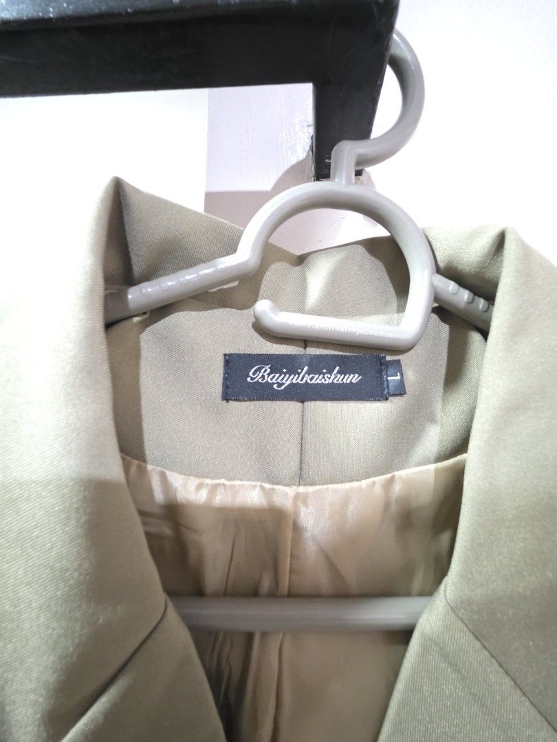 Baiyibaishun Long Coat - Size L (Category: Coats, Jackets and Outerwear) located in Marikina City. Submitted by wilmiles (Listing ID 1421393411, Image 2). Description: - Brand: Baiyibaishun - Style: Long coat - Design: Classic with notched lapel - Features: Two front pockets, single-button closure - Fit: Tailored - Color: Neutral - Size: L.