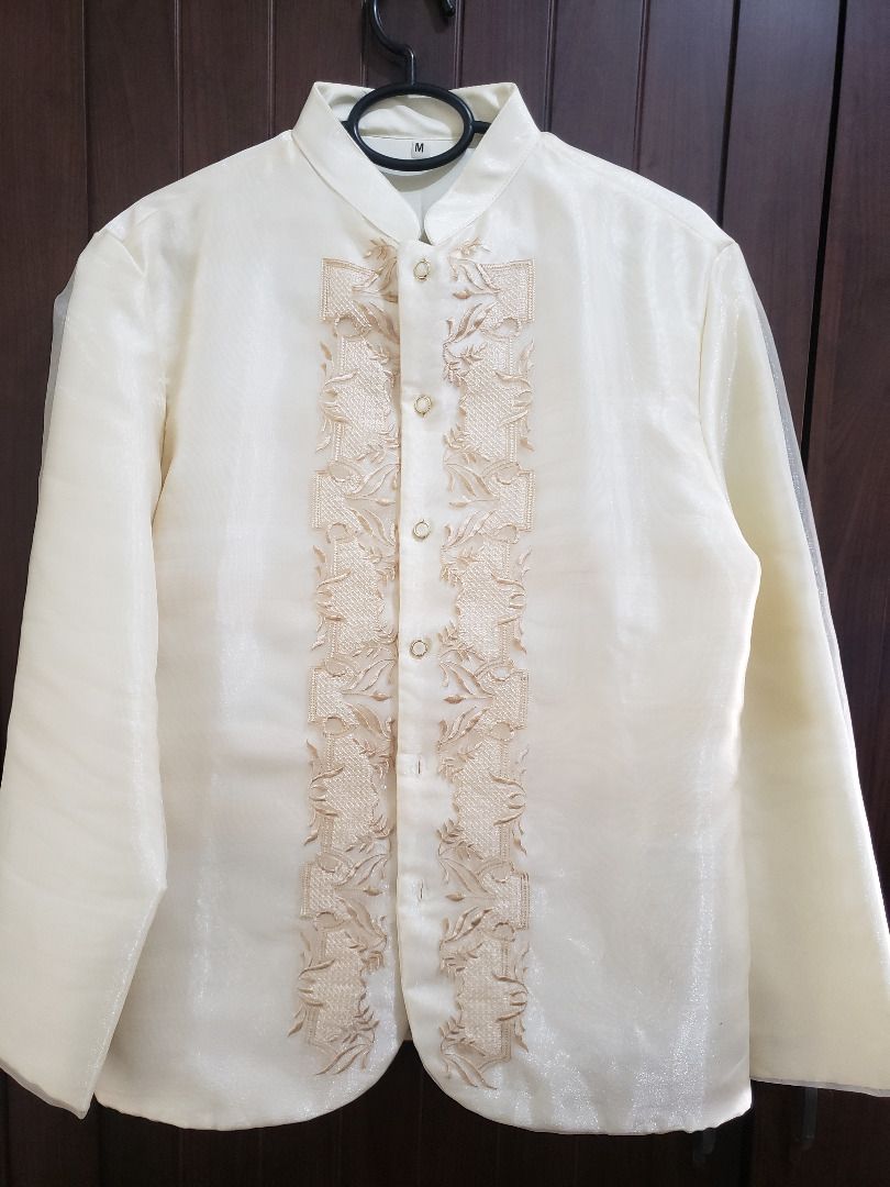 Barong Tagalog - Cream with Embroidery - Medium (Category: Formal Shirts) located in Makati City. Submitted by akukaselabs (Listing ID 1421366547, Image 1). Description: Embroidered Barong Tagalog Chinese Collar Cream Large 📏 Measurements (+/-3cm) Chest: 51cm pit-to-pit Length: 69 cm Sleeves: 58 CM RFS: Decluttering Location: Fairlane Residences, Kapitolyo Pasig Shipping: Buyer shoulders fee.