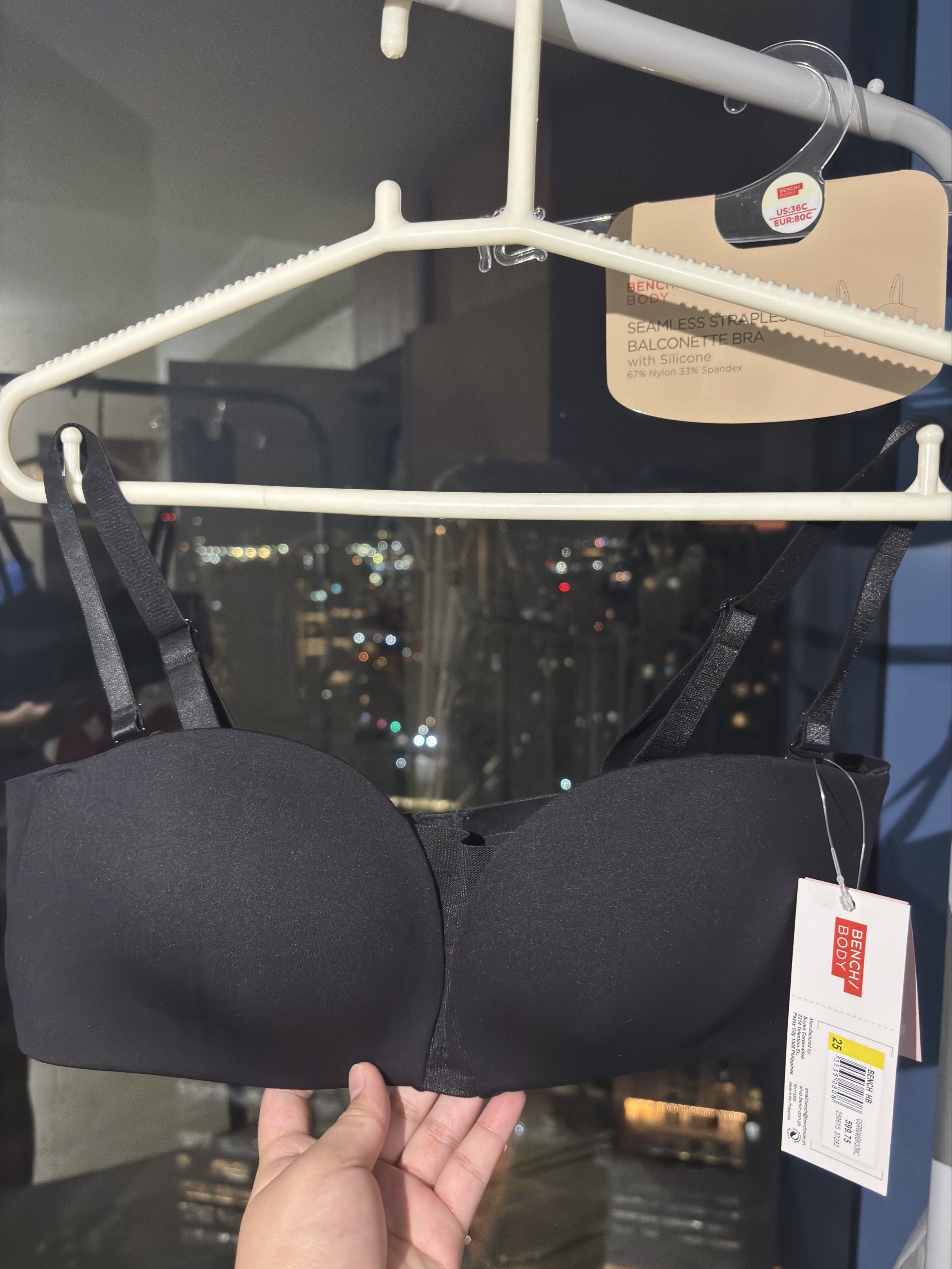 Bench Body Seamless Strapless Balconette Bra (Category: Undergarments & Loungewear) located in Makati City. Submitted by regina_2727 (Listing ID 1421382951, Image 1). Description: Black Bench Body seamless strapless balconette bra. -Features a silicone design for a secure fit. -The bra has adjustable straps and a hook-and-eye closure at the back. -The tag indicates the size is 36C and the original price is 599.75 PHP..