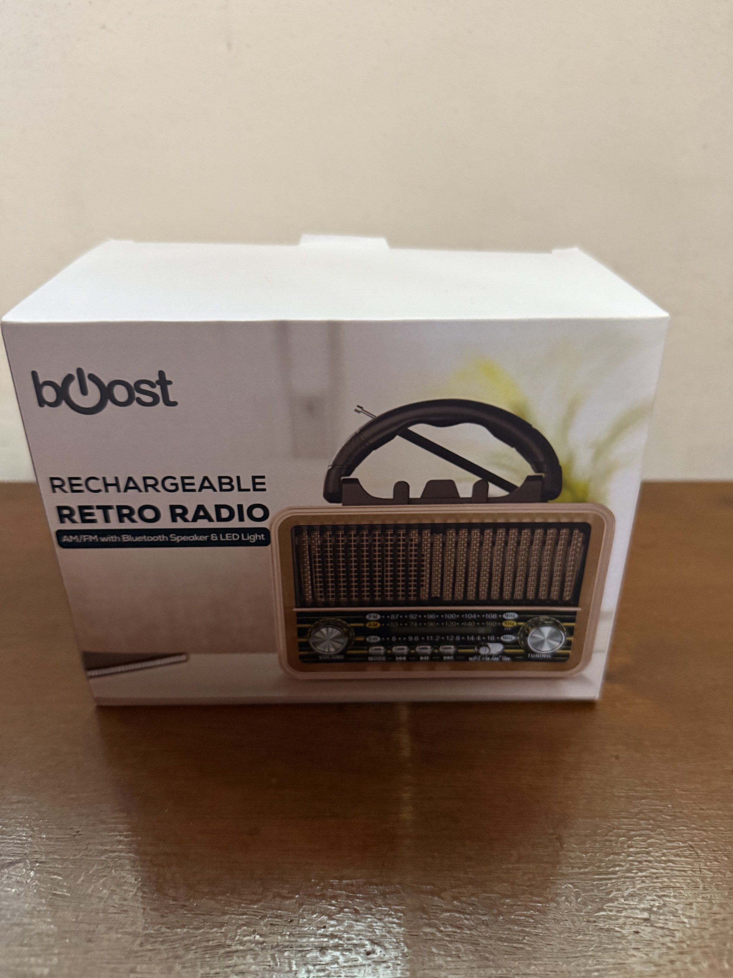 Boost Rechargeable Retro Radio (Category: Portable Music Players) located in Bacoor. Submitted by swiftbird-8163bf (Listing ID 1421300524, Image 1). Description: - Retro design with wooden finish - AM/FM radio and Bluetooth speaker - Built-in LED light - Rechargeable for portability - Easy-to-use volume and tuning knobs - Comes in original packaging.