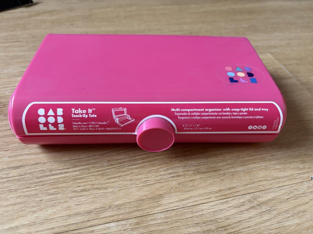 Caboodles Take It Touch-Up mini in pink (Category: Makeup) located in Manila. Submitted by pepperang318 (Listing ID 1421336839, Image 2). Description: - Caboodles Take It Touch-Up Tote - Pink color - Features a mirror - Multiple compartments for storage - Snap-tight lid - Round latch - Dimensions: 8.13 x 5 x 1.94 inches - Made in China.