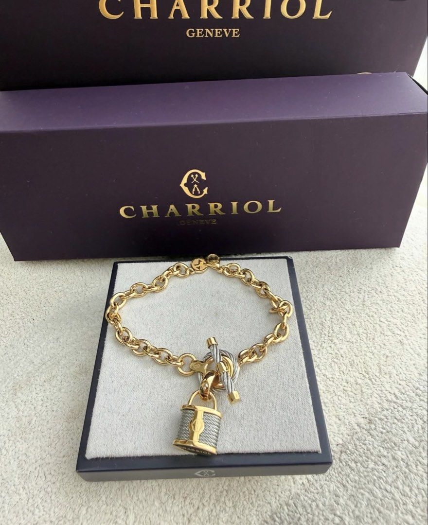 Charriol Gold Bracelet with Padlock Charm (Category: Luxury Accessories) located in San Pablo. Submitted by with.jacque (Listing ID 1421450758, Image 1). Description: - Authentic Charriol bracelet - Features a gold chain - Includes a unique padlock charm - Secure T-bar clasp - Comes with the original Charriol box - Adds a touch of luxury to any outfit.
