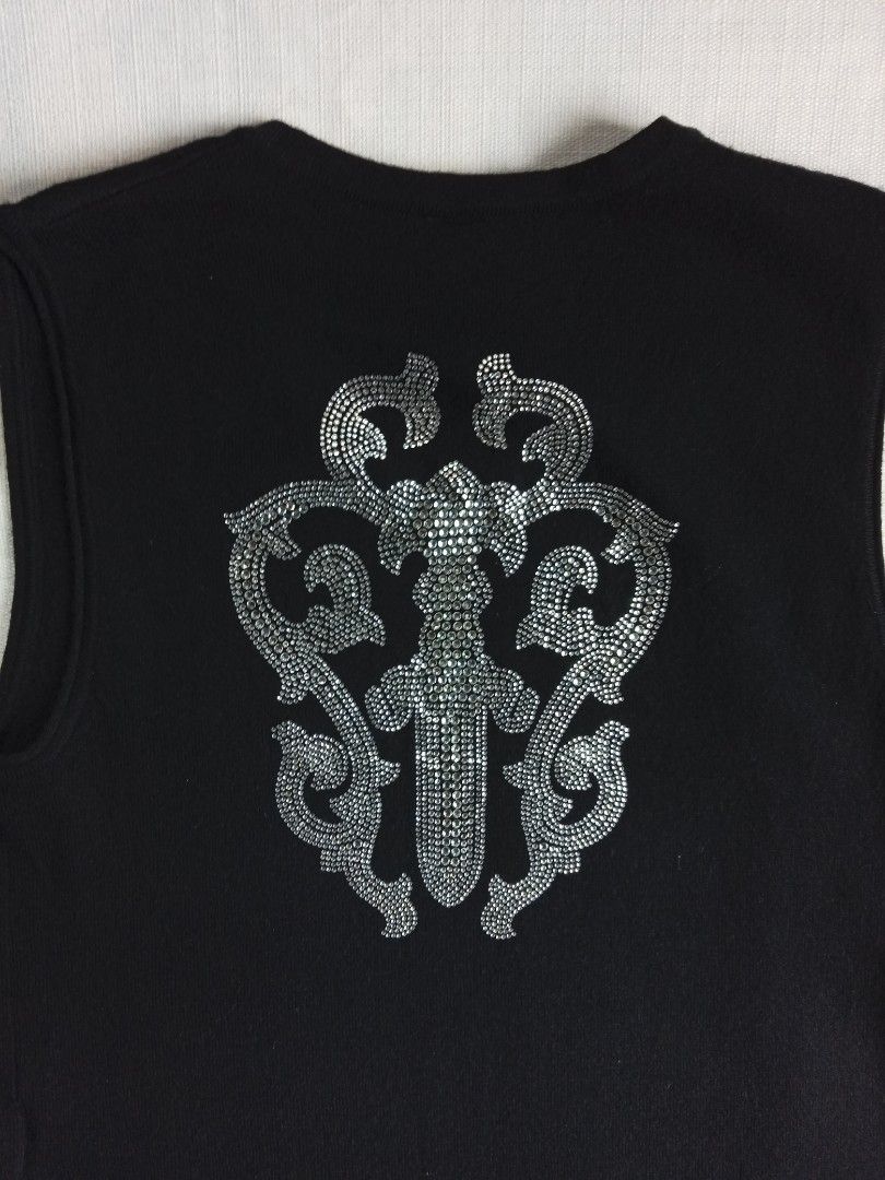 Chrome hearts rhinestone dagger cashmere vest (Category: Vests) located in Bagabag. Submitted by thrift_stories96 (Listing ID 1421431075, Image 2). Description: Chrome hearts rhinestone dagger cashmere vest Unisex fitment Mens small to medium Womens medium to large Length - 21 Width - 17.5 stretch up to 19 Condition - excellent No flaw.