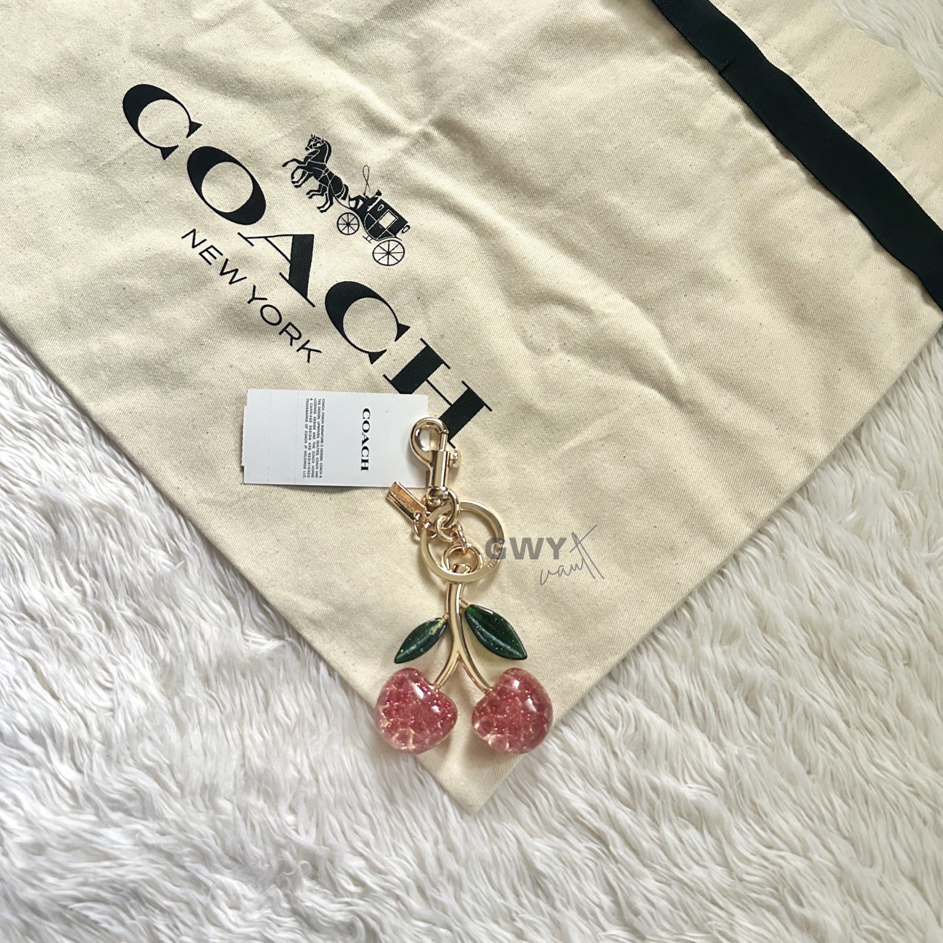 Coach Pink Cherry Charm (Category: Charms) located in Paranaque City. Submitted by gwyvault (Listing ID 1421407061, Image 1). Description: COACH Cherry Charm 🐾 Authentic from Coach outlet (pasabuy) 🐾 Pink/Gold color 🐾 Rank S — brand new (removed tag) 🦴 NOTE: Actual photo posted. I can provide my personal account and do video call for a safe transaction. Don’t just ‘paws’ and look—make an offer! My 7 shih tzus and I are ready to deal. 🐶🤍.