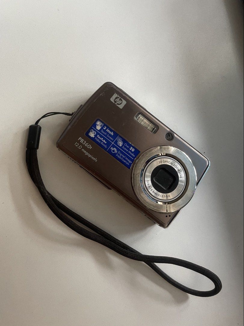 DigiCam HP PB360t Digital Camera (Category: Cameras) located in Manila. Submitted by ava_declutters (Listing ID 1421411511, Image 1). Description: - Dm for sample pics - Negotiable - Lcd problem :( - Working Flash (last time I used) - Bought from ig last 2024, used for a year then it’s suddenly like this idk why Inclusion: - Charger - Battery Feel free to ask questions ^^.