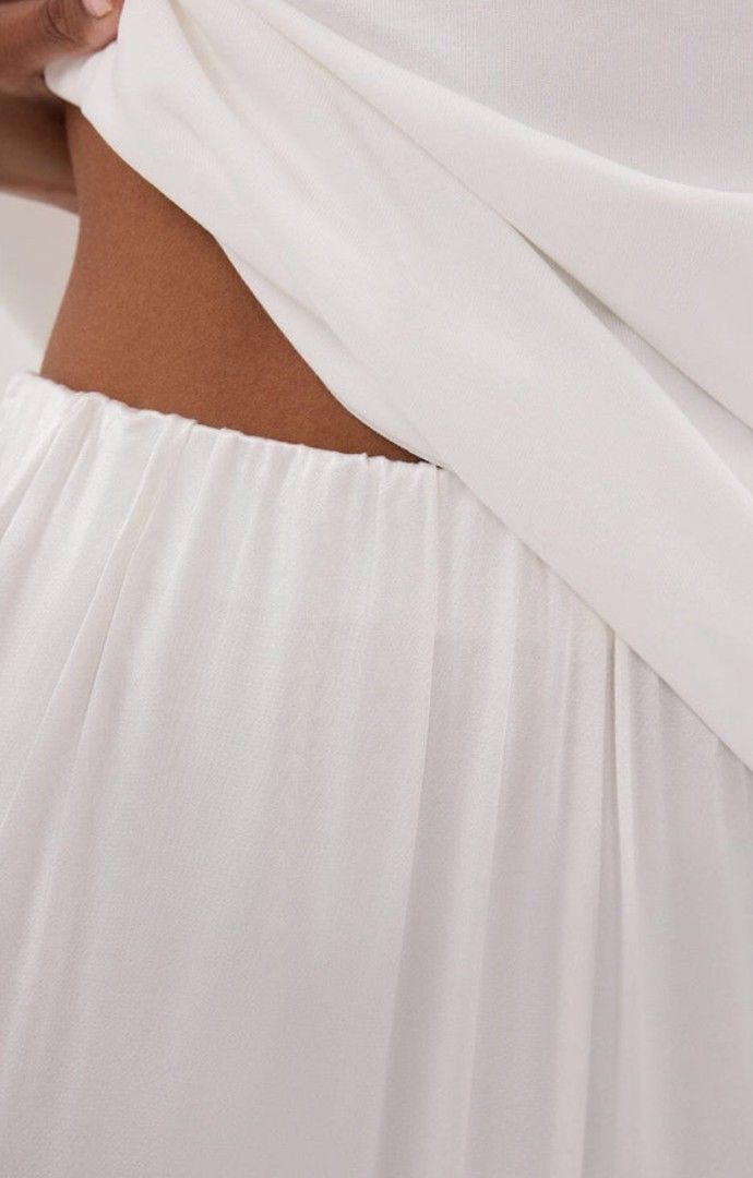 DISSH Monica White Satin Pants Size 08 (Category: Other Bottoms) located in Muntinlupa City. Submitted by cezzy82 (Listing ID 1421355192, Image 3). Description: - DISSH Monica satin pants - Wide-leg style - Size 08 - Elastic waistband - Original price: $139.99.
